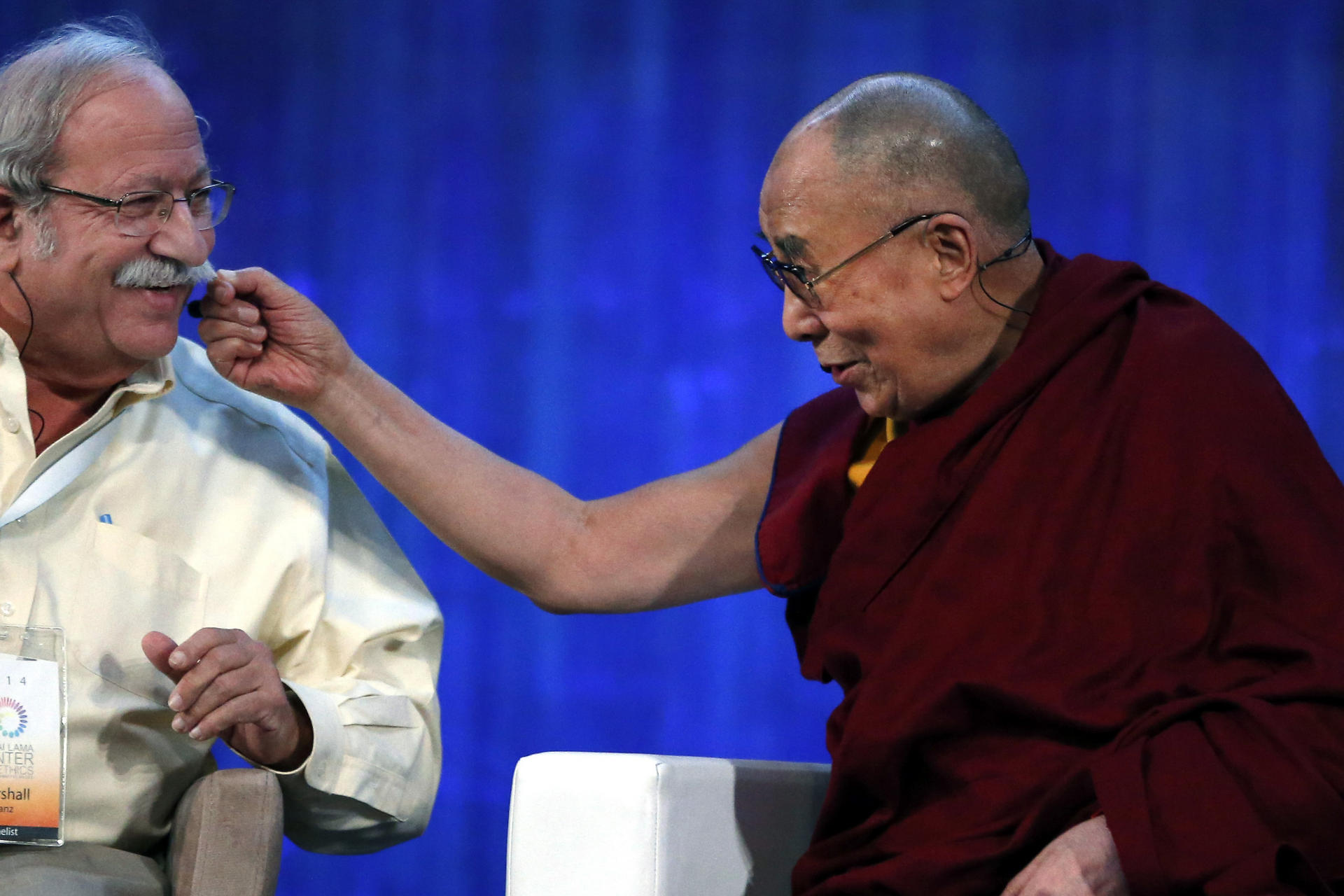The Dalai Lama and Harvard University's Professor Marshall Ganz during a panel discussion in the United States in October. Photos: AP; AFP; Corbis; EPA