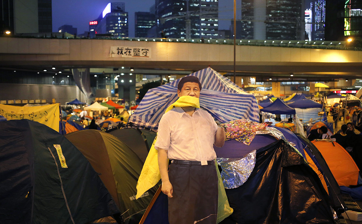 A life-sized cut-out of President Xi Jinping is seen in the Admiralty protest site. Photo: EPA