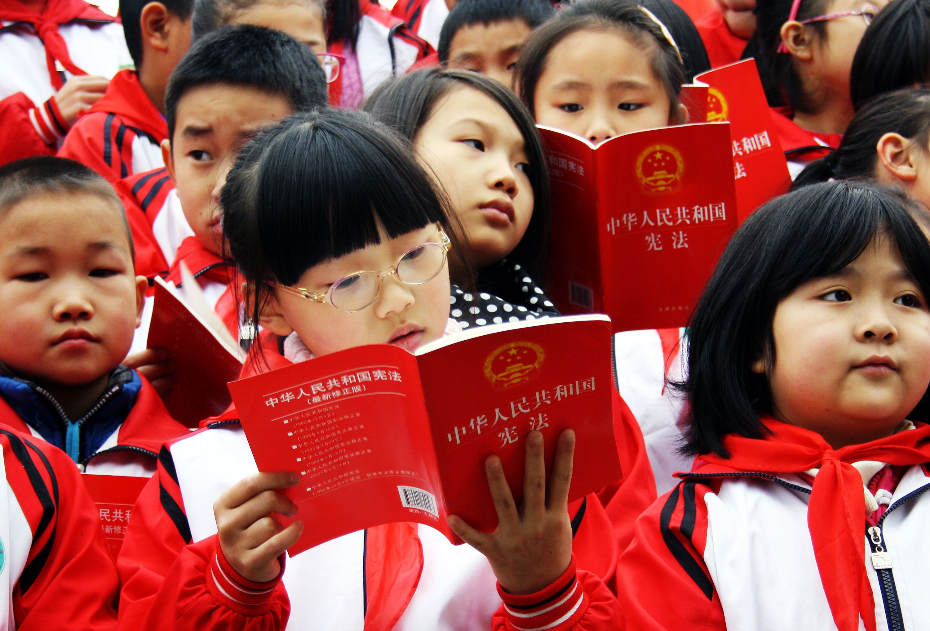 Students in Chongqing get acquainted with the Chinese constitution. Photo: AFP
