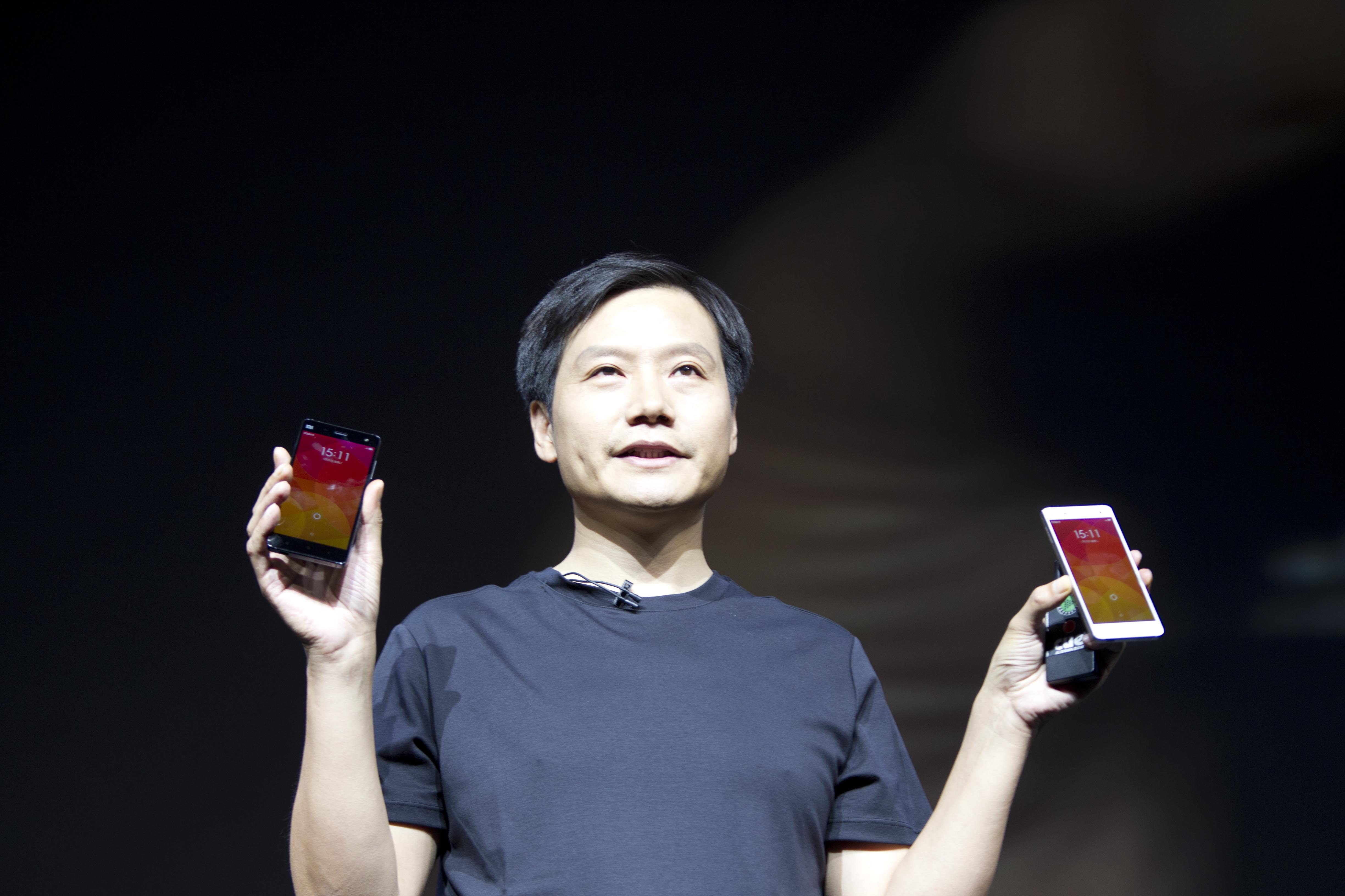 Lei Jun, CEO of Xiaomi, launches the new Xiaomi 4 smart phone in Beijing on July 22, 2014. Photo: Simon Song