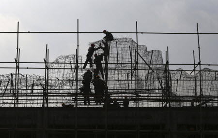 The mainland’s property market adjustment has been longer and sharper than expected. Photo: Reuters