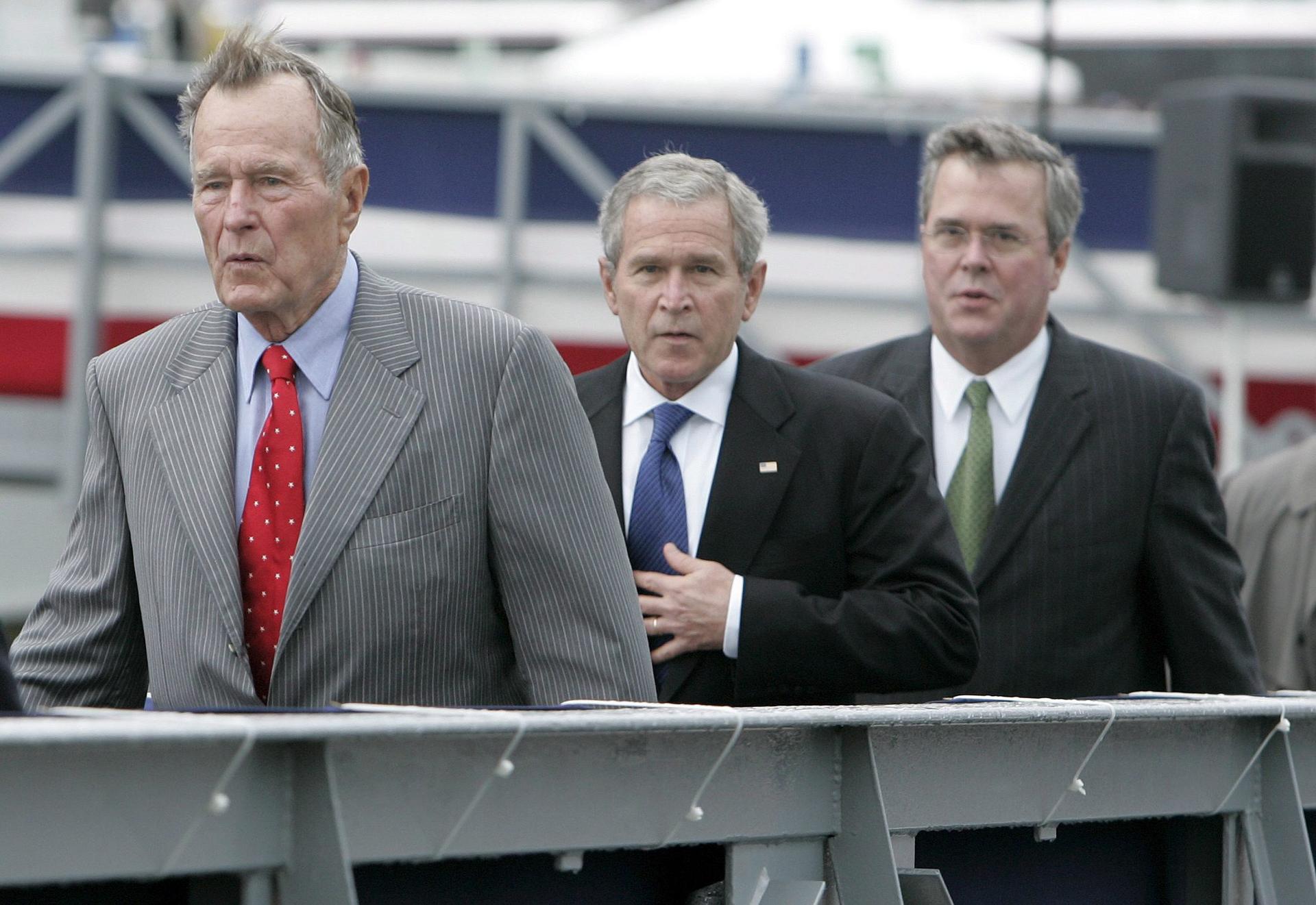 Jeb Bush (right) hopes to follow his father, George H.W. Bush, and brother George W. Bush into the White House. Photo: EPA