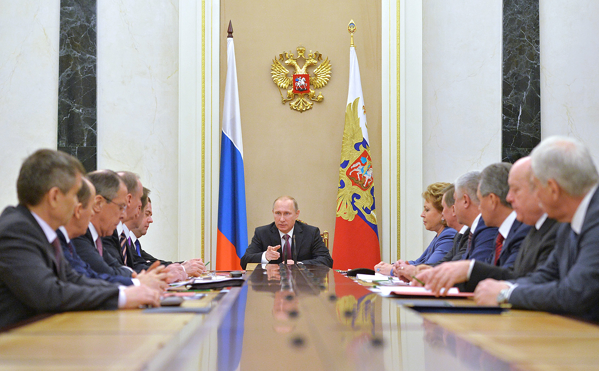 President Vladimir Putin (centre) heads Russia's Security Council at the Kremlin in Moscow on Friday. Photo: AP