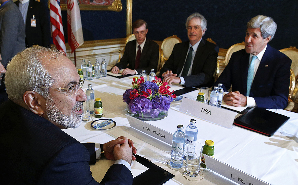 Iran's Foreign Minister Mohammad Javad Zarif (left) with US Secretary of State John Kerry (right) in Vienna during talks between the foreign ministers of the six powers negotiating with Tehran on its nuclear programme in July 2014. Photo: AFP