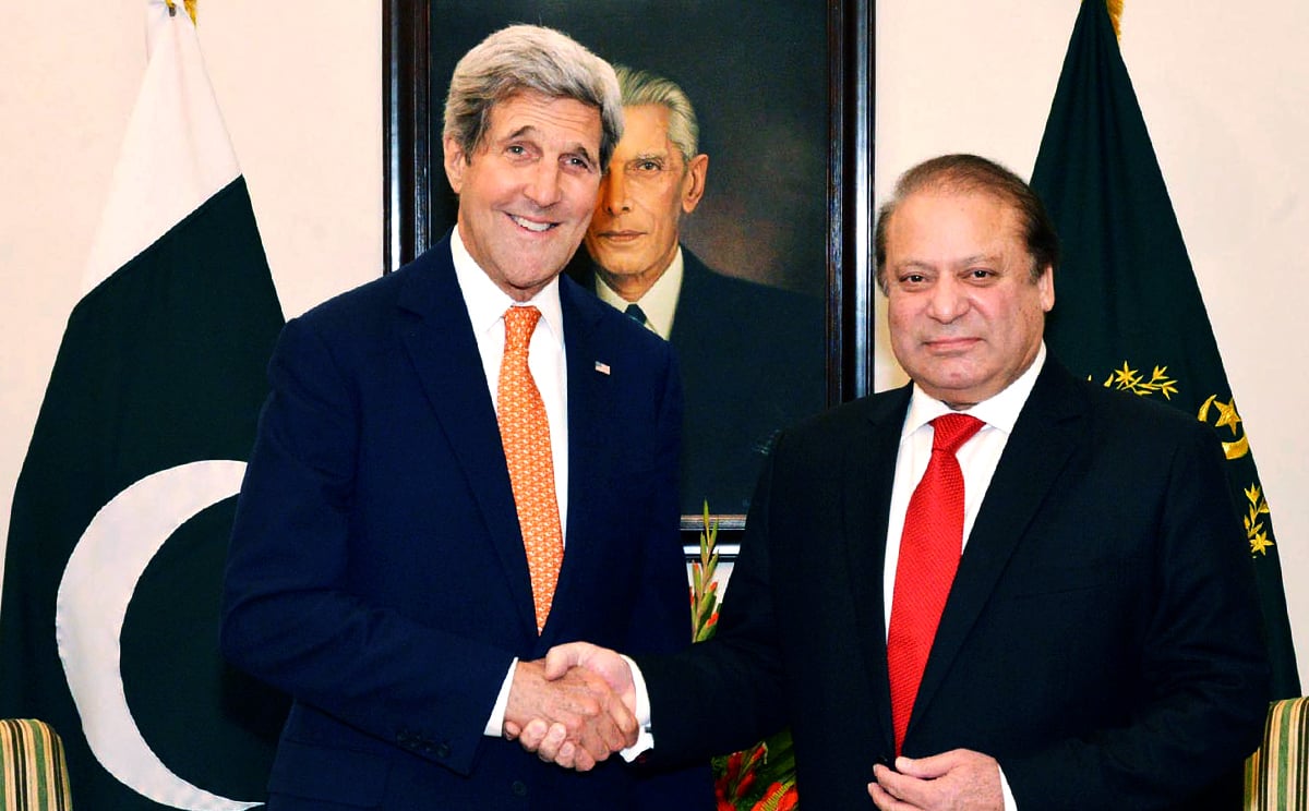 US Secretary of State John Kerry (left) shakes hands with Pakistan Prime Minister Nawaz Sharif shortly after arriving in the capital Islamabad on Monday. Photo: AFP