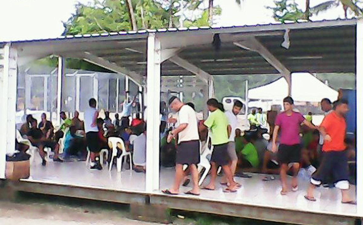 Asylum seekers are pictured inside the Manus Island detention centre in Papua New Guinea on January 13, 2015. Hundreds of asylum seekers have gone on hunger strike. Photo: Reuters