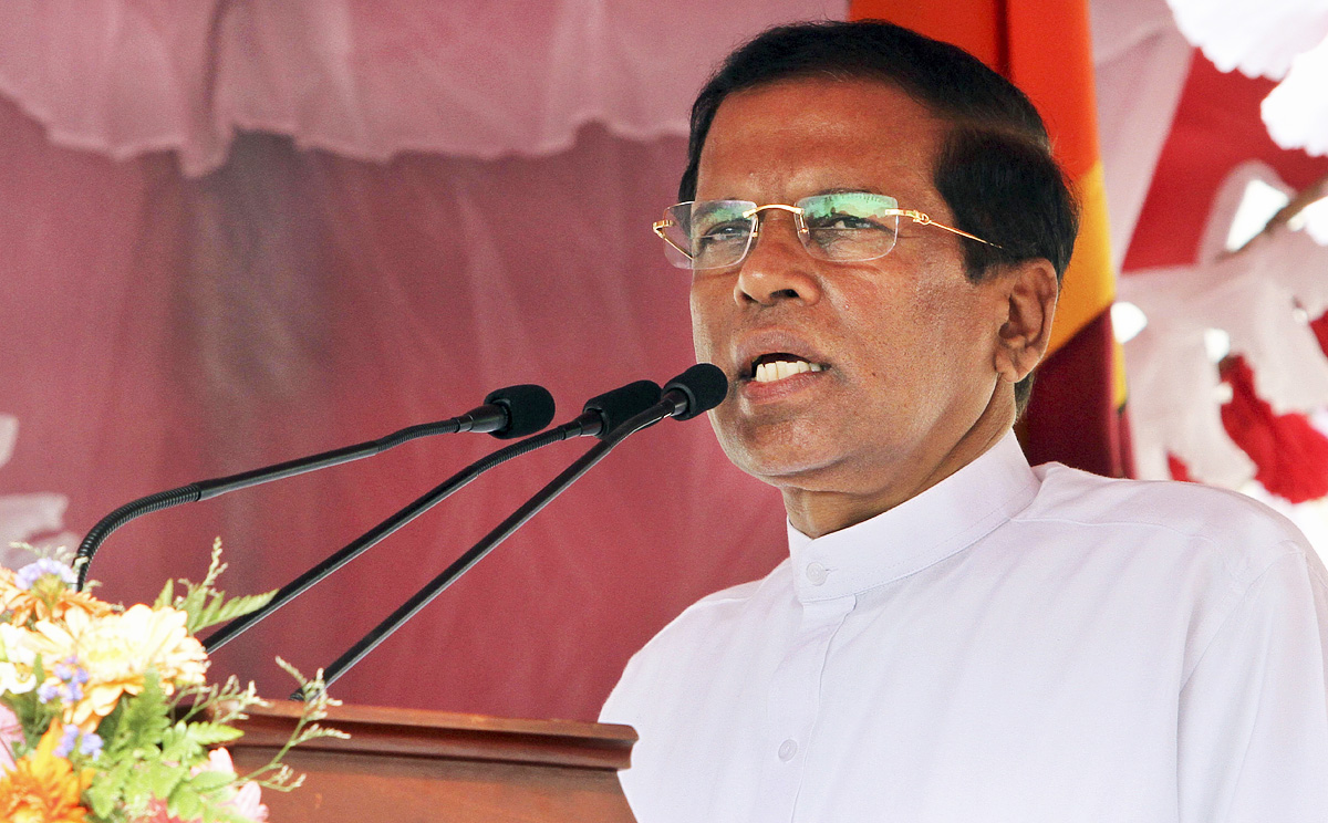 Sri Lanka’s new leader Maithripala Sirisena addresses the nation outside the Temple of Tooth in Kandy on Sunday. Photo: AP