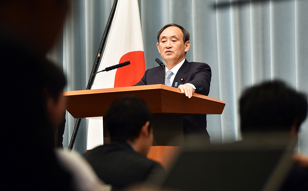 Japan's Chief Cabinet Secretary Yoshihide Suga answers questions during a press conference at the prime minister's official residence in Tokyo on Thursday. Photo: AFP