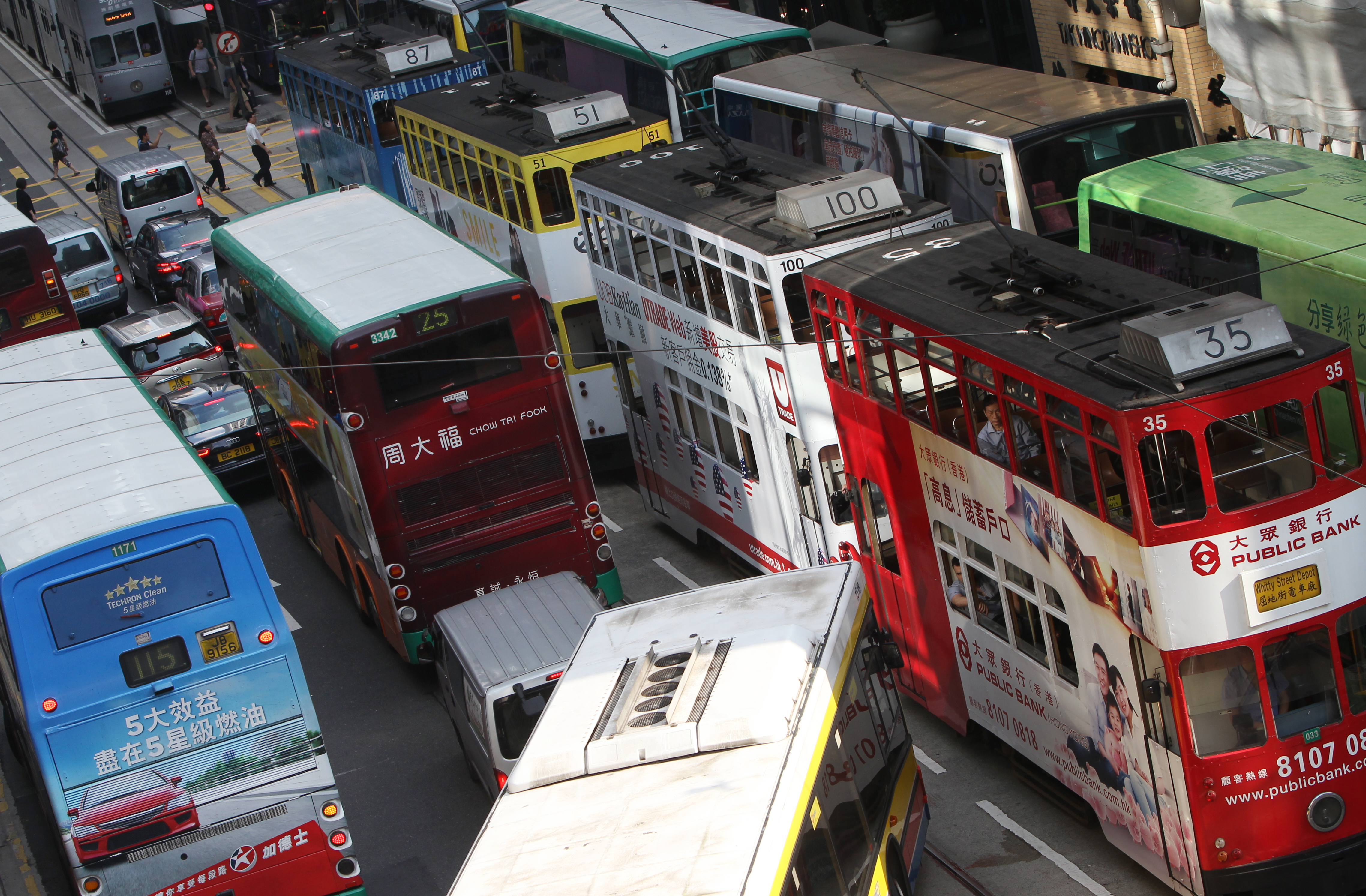 Minibuses and buses carry 71 per cent of total daily passenger boardings, but account for only 5 to 25 per cent of traffic on major roads. Photo: David Wong