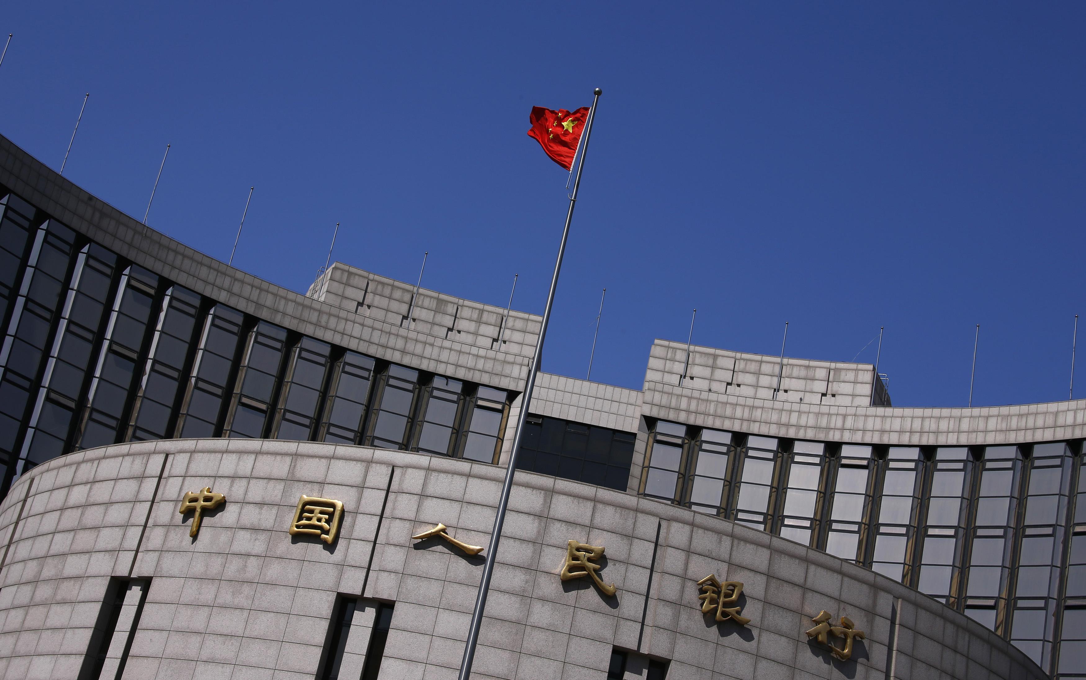 The PBOC cut China's bank reserve ratio by 50 basis points in a bid to spur growth on Wednesday. Photo: Reuters