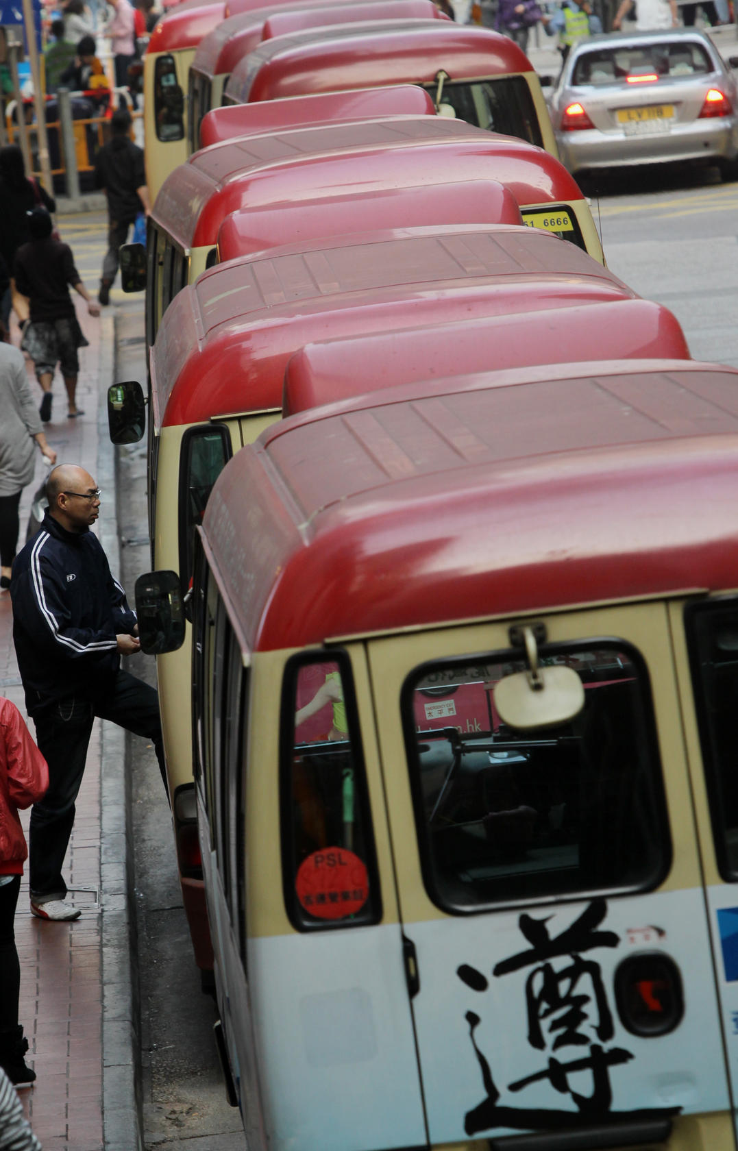 Commuters may not want to be "entertained" on minibuses. Photo: David Wong