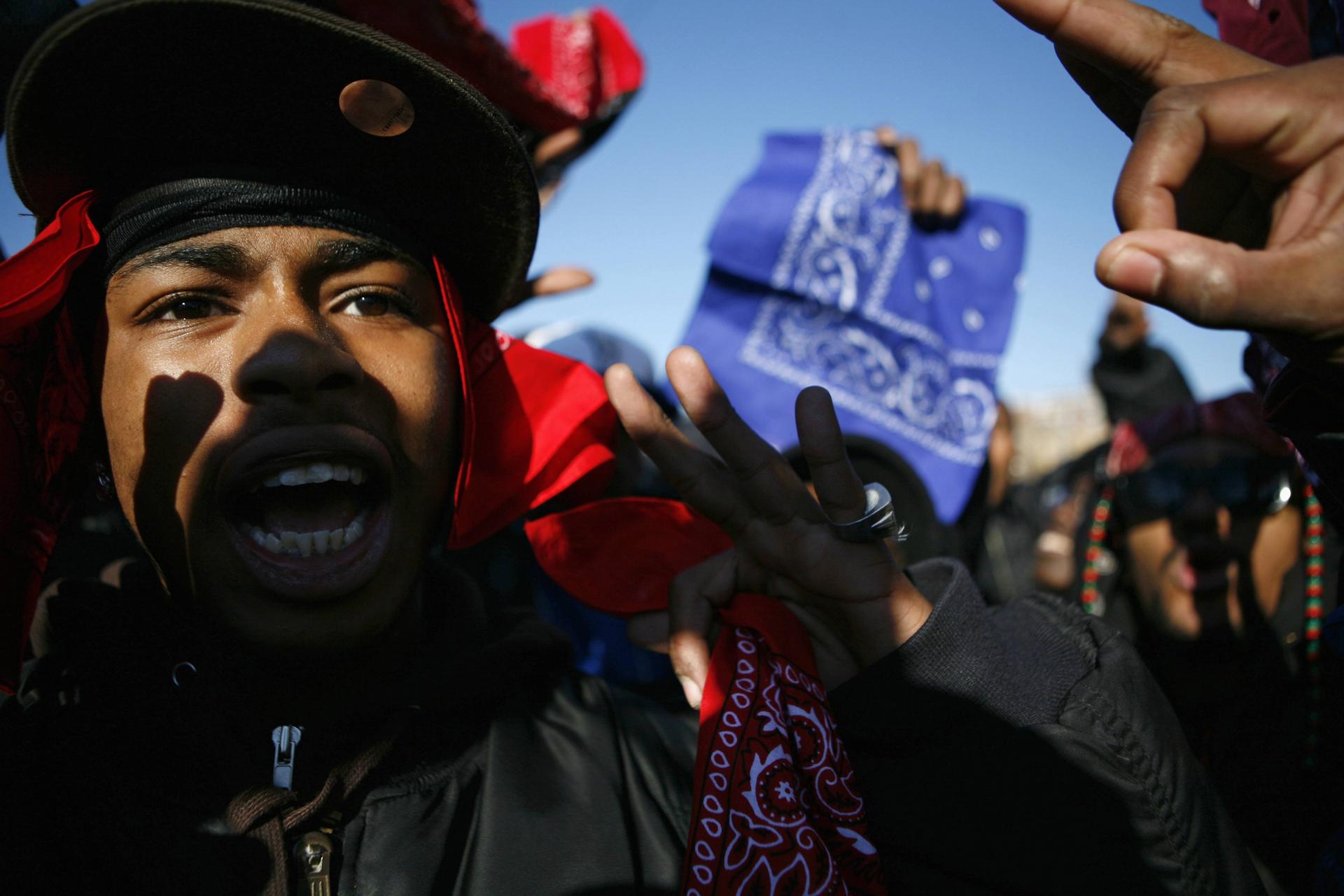 Crips and Bloods unite at a rally in New York against the shooting of Sean Bell, who was killed by police on his wedding day. Photo: Reuters