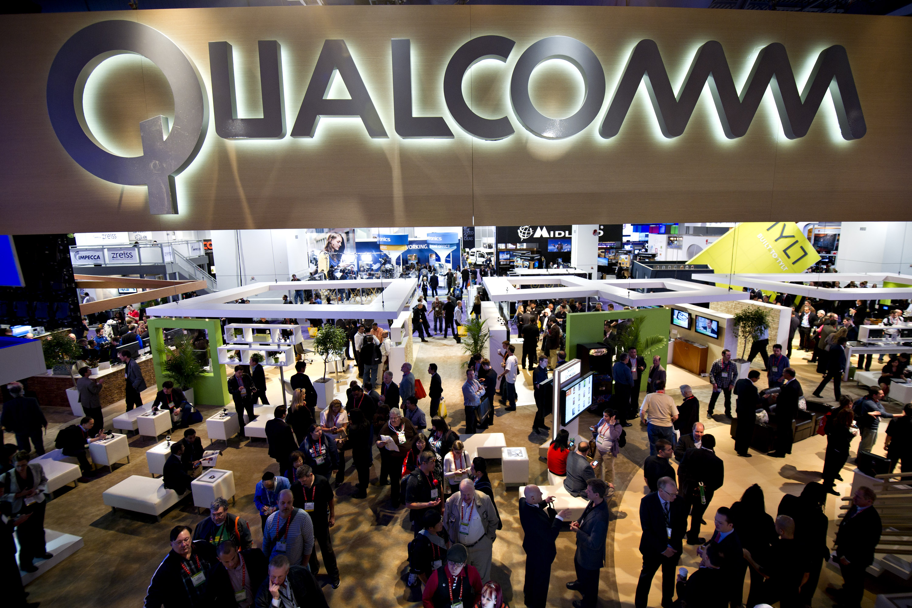 Qualcomm, the world’s largest supplier of mobile chips, agreed to pay the fine to end a 14-month long government probe. Photo: Bloomberg