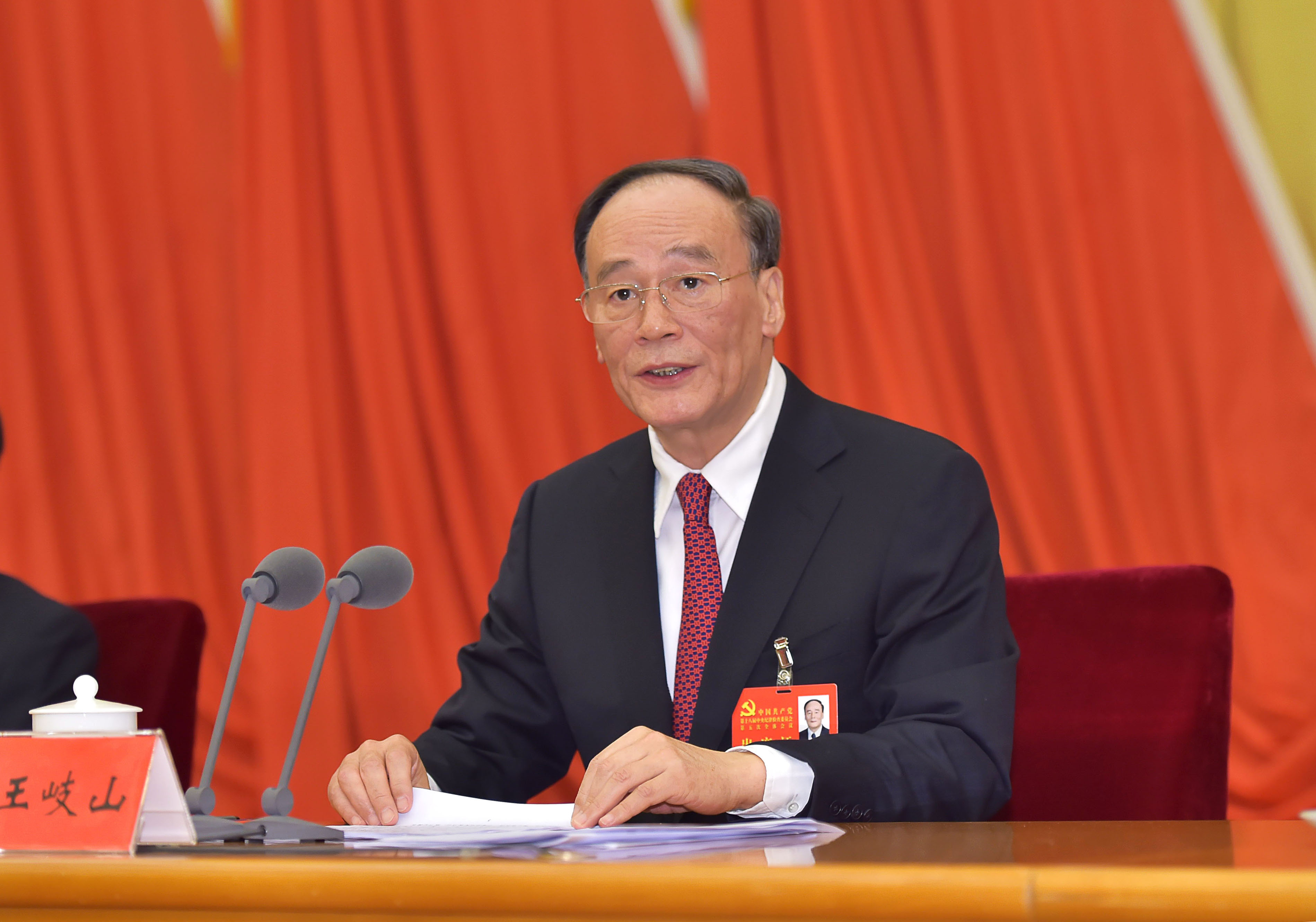 The government's anti-graft agency, led by Wang Qishan, has carried out spot checks on more than 60,000 officials since last year. Photo: Xinhua