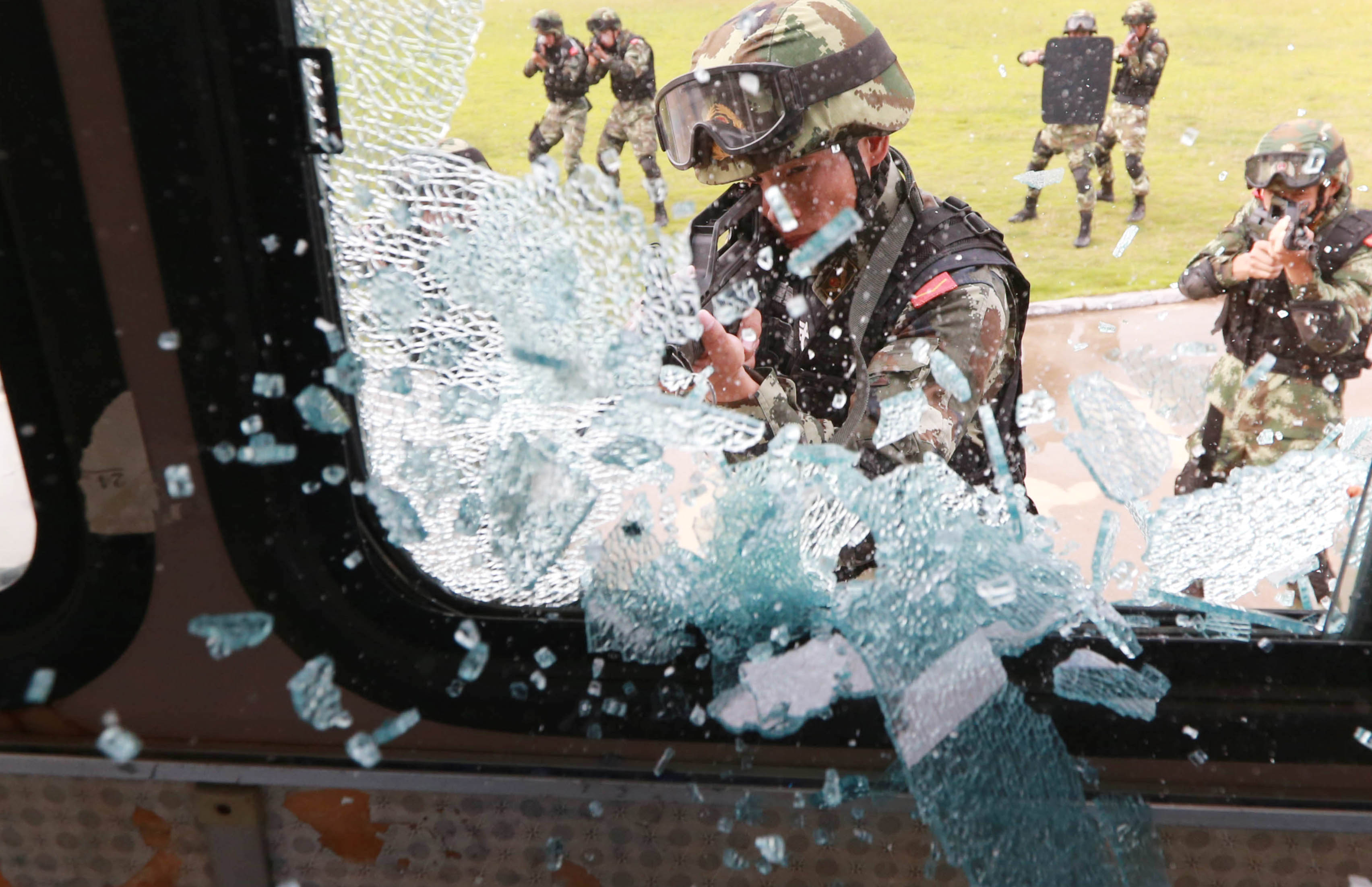 Police officers take part in an anti-terrorism drill in Guangxi. The law is not meant to address an academic issue, but aims to deal with a serious crime. Photo: Xinhua