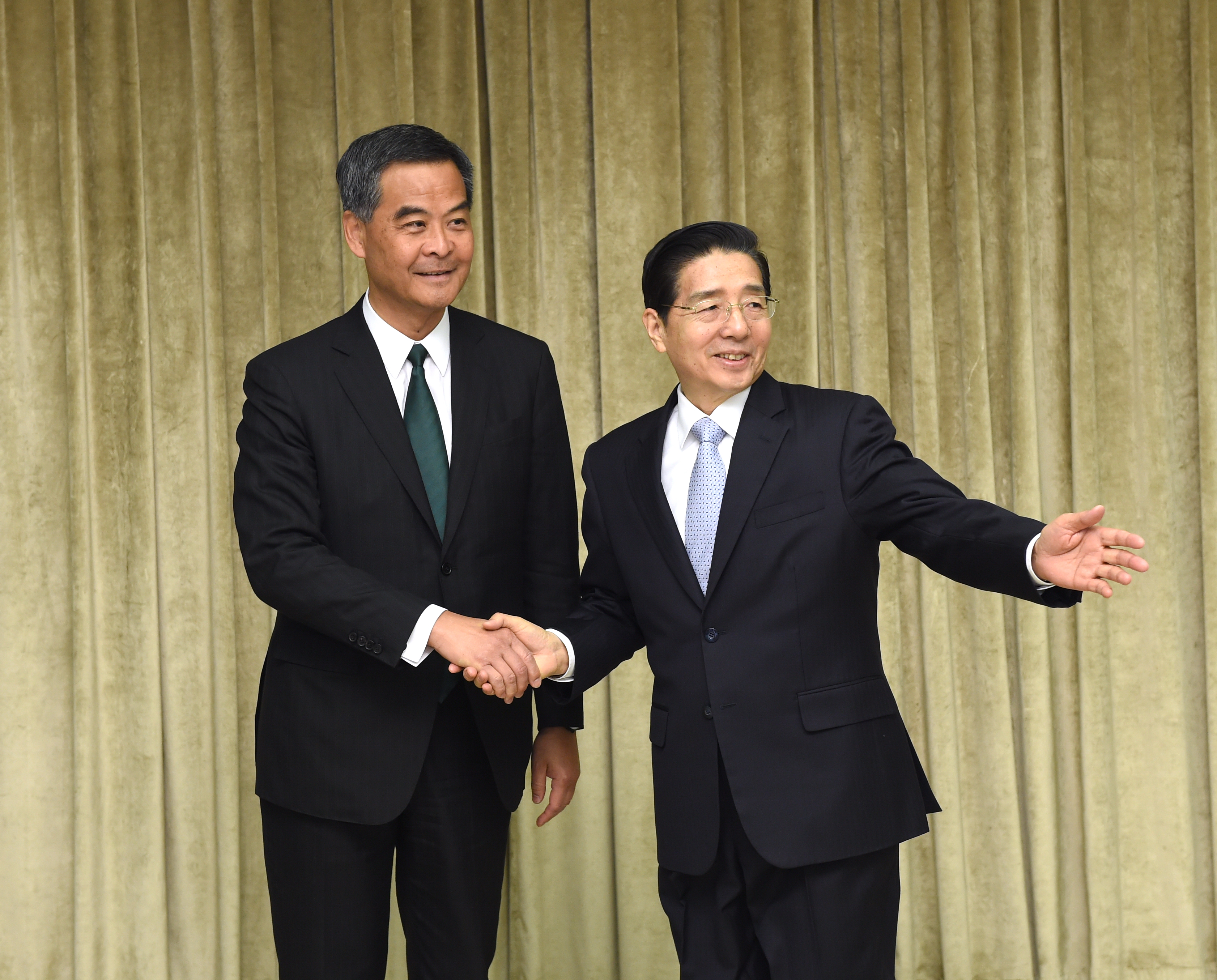 Leung Chun-ying meets with Public Security Minister Guo Shengkun at the annual sessions in Beijing. The chief executive appears to enjoy the full confidence of the central government. Photo: Xinhua
