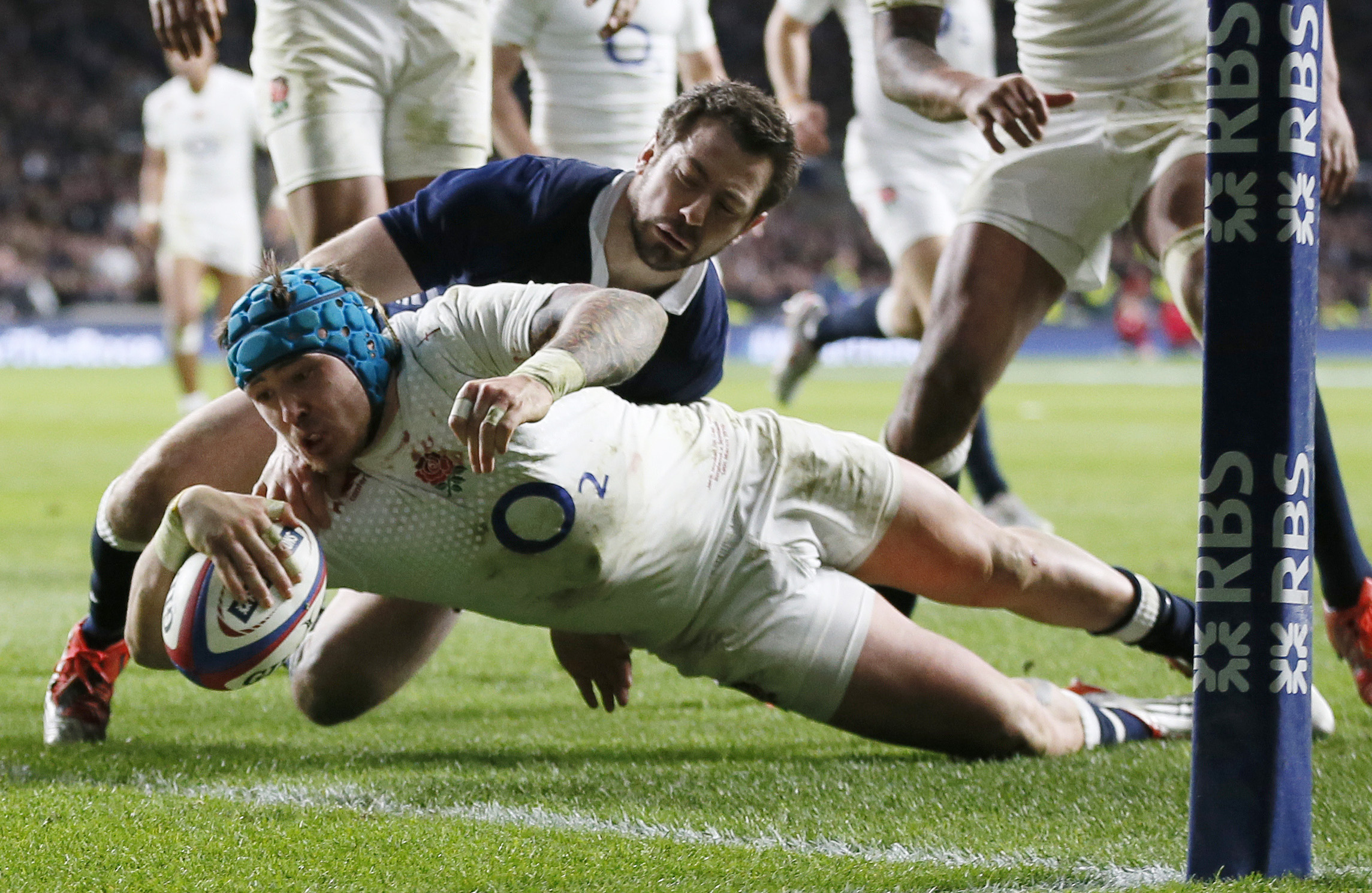 Jack Nowell scores the third try for England. Photo: Reuters
