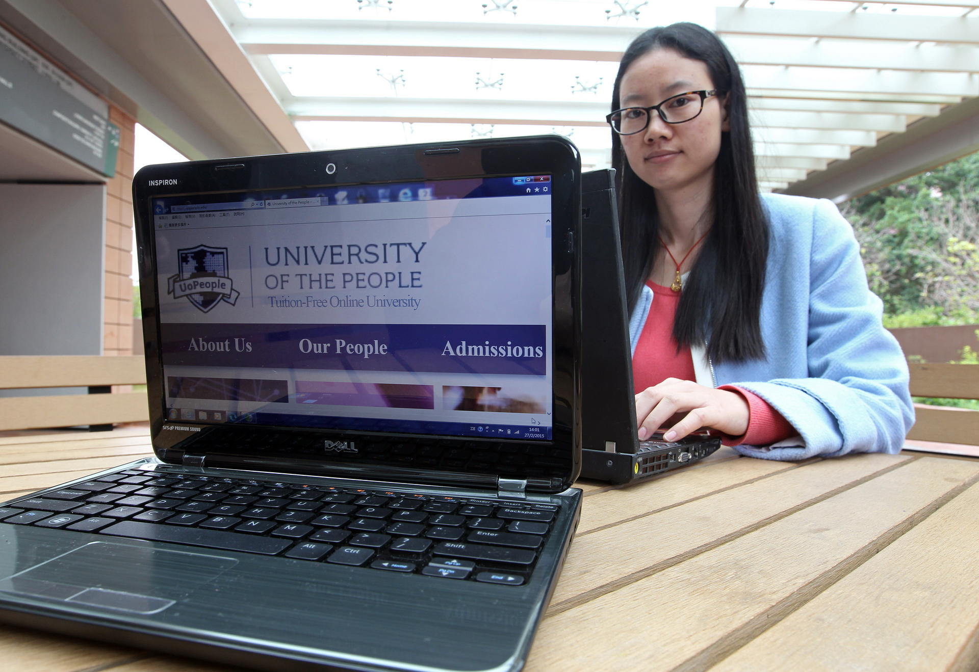 Cao Tingting is gaining business knowledge online while finishing her doctoral degree at HKU. Photo: Edward Wong