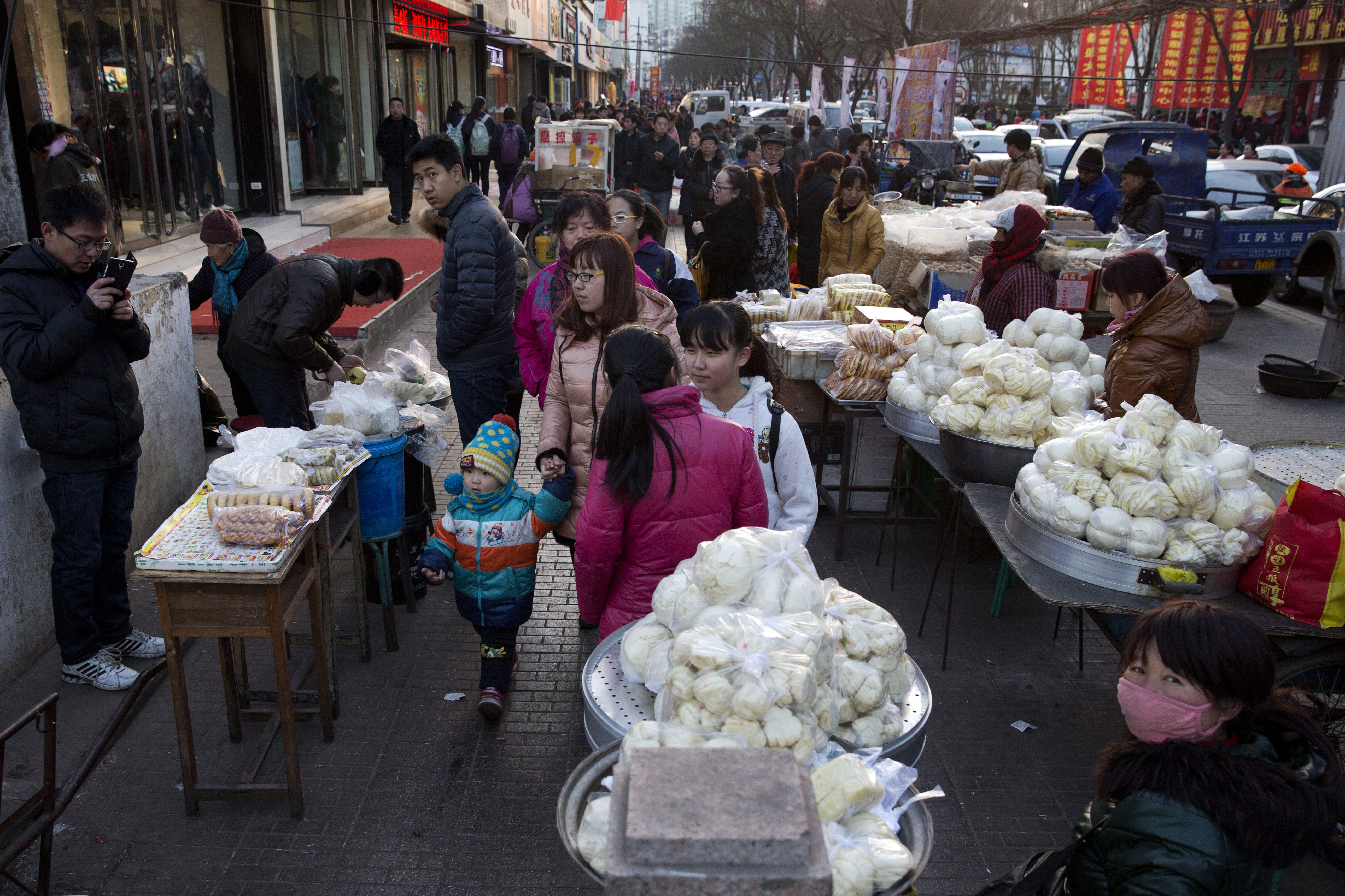 A market in China's Shanxi province as a survey showed an overall slowdown in the country's economy in the first quarter of 2015. Photo: AP
