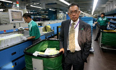 Tam Wing-pong retired as postmaster general soon after the study began. Photo: Dickson Lee