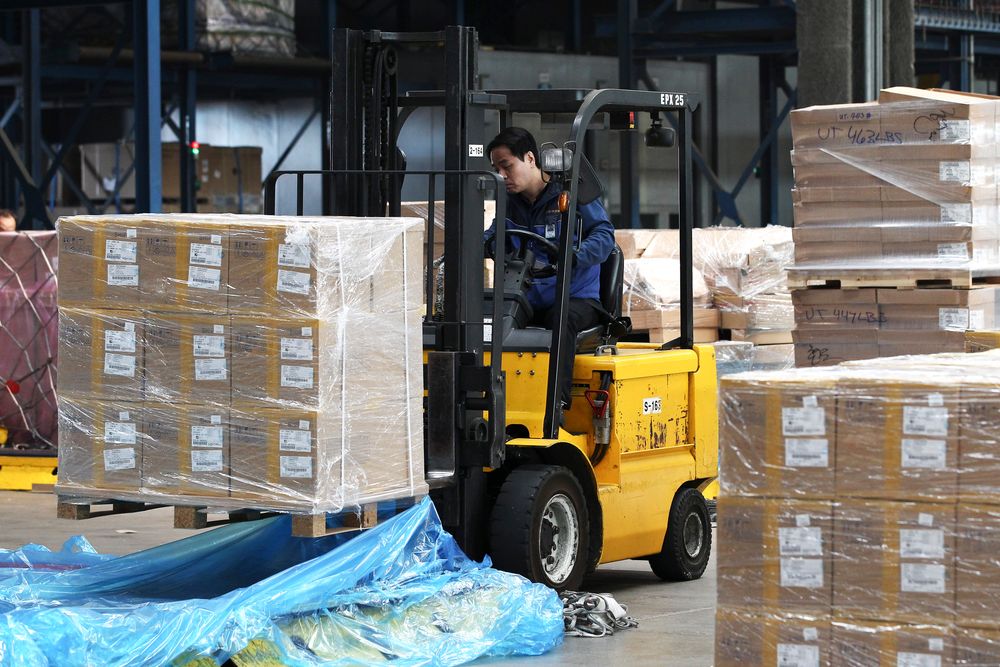 Packages arrive from China at Incheon International Airport. Trade and investment between the two nations have grown. Photo: Bloomberg