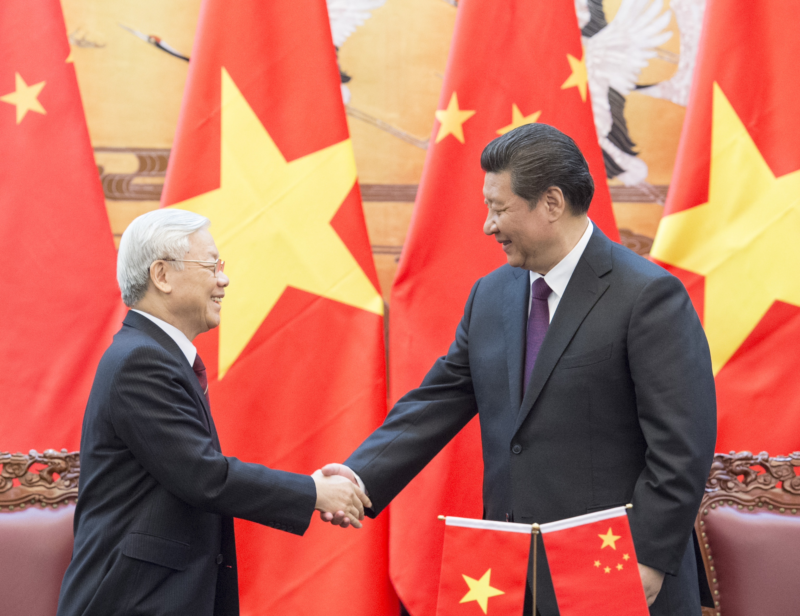 President Xi Jinping (right), who is also the Chinese  Communist Party's general secretary, attends a signing ceremony with Nguyen Phu Trong, general secretary of Vietnam's Communist Party, after their talks in Beijing on Tuesday. Photo: Xinhua