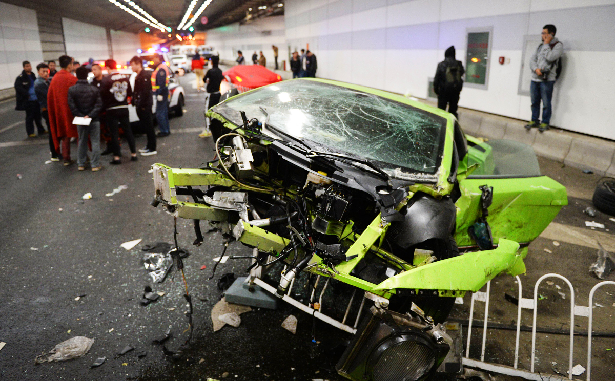 A Lamborghini was destroyed in the crash in the Datun Road Tunnel in Chaoyang district in Beijing on Saturday.  Photo: AFP