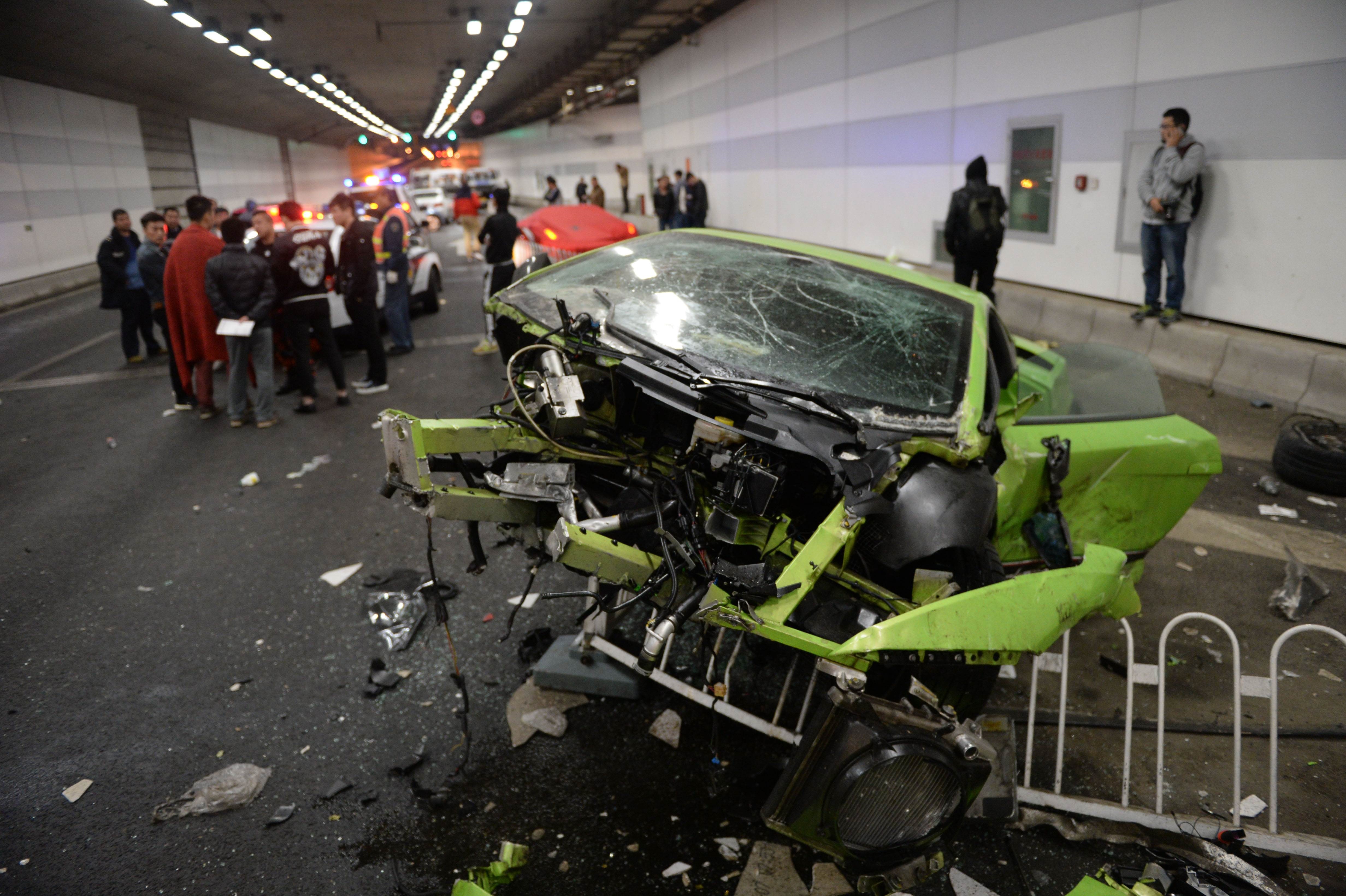 The remains of Tang Wentian's Lamborghini, which crashed with a Ferrari in a Beijing tunnel. Photo: AFP