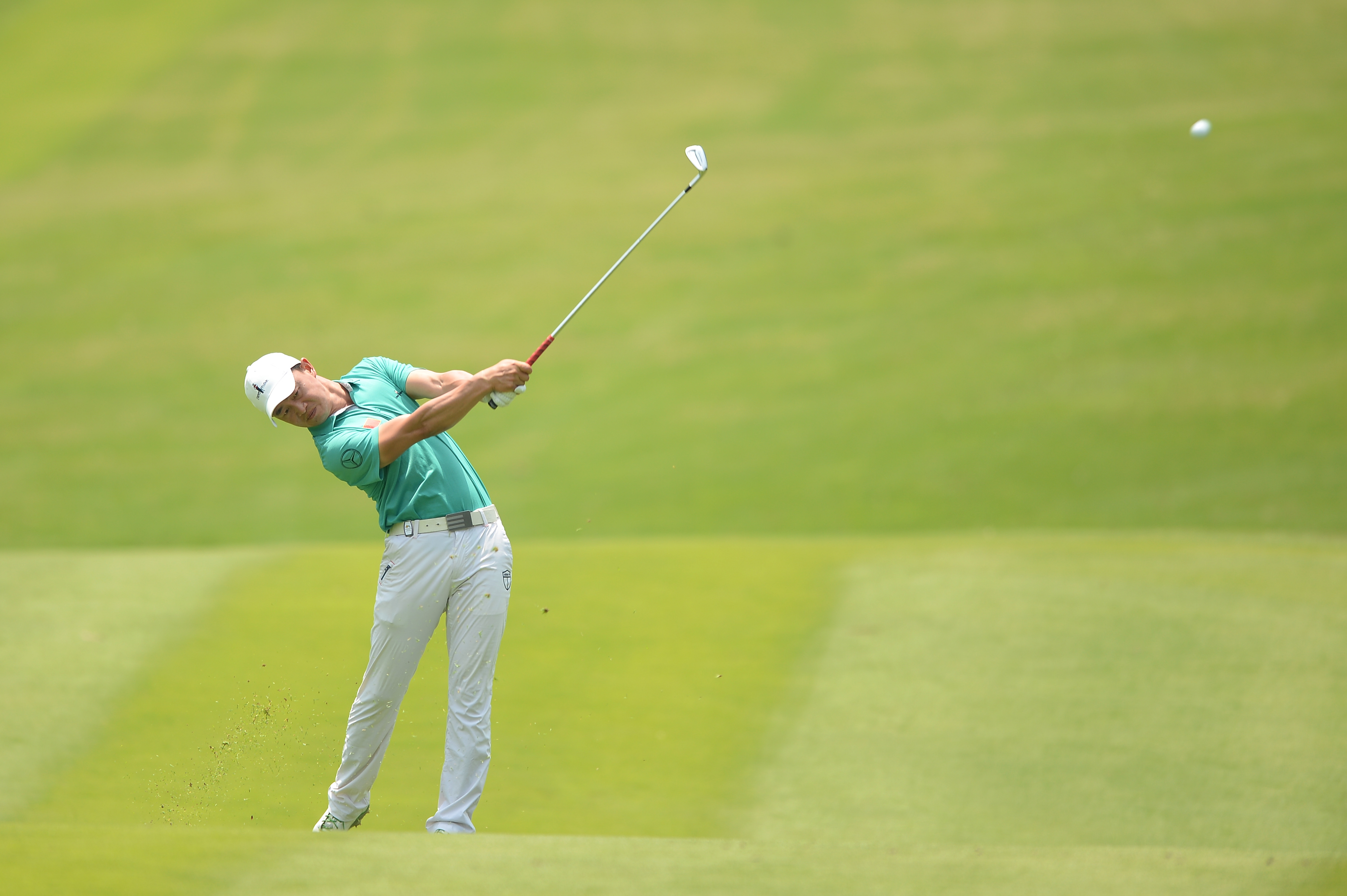 Huang Wenyi in action at the Genzon Golf Club on Thursday. Photos: SCMP Pictures   