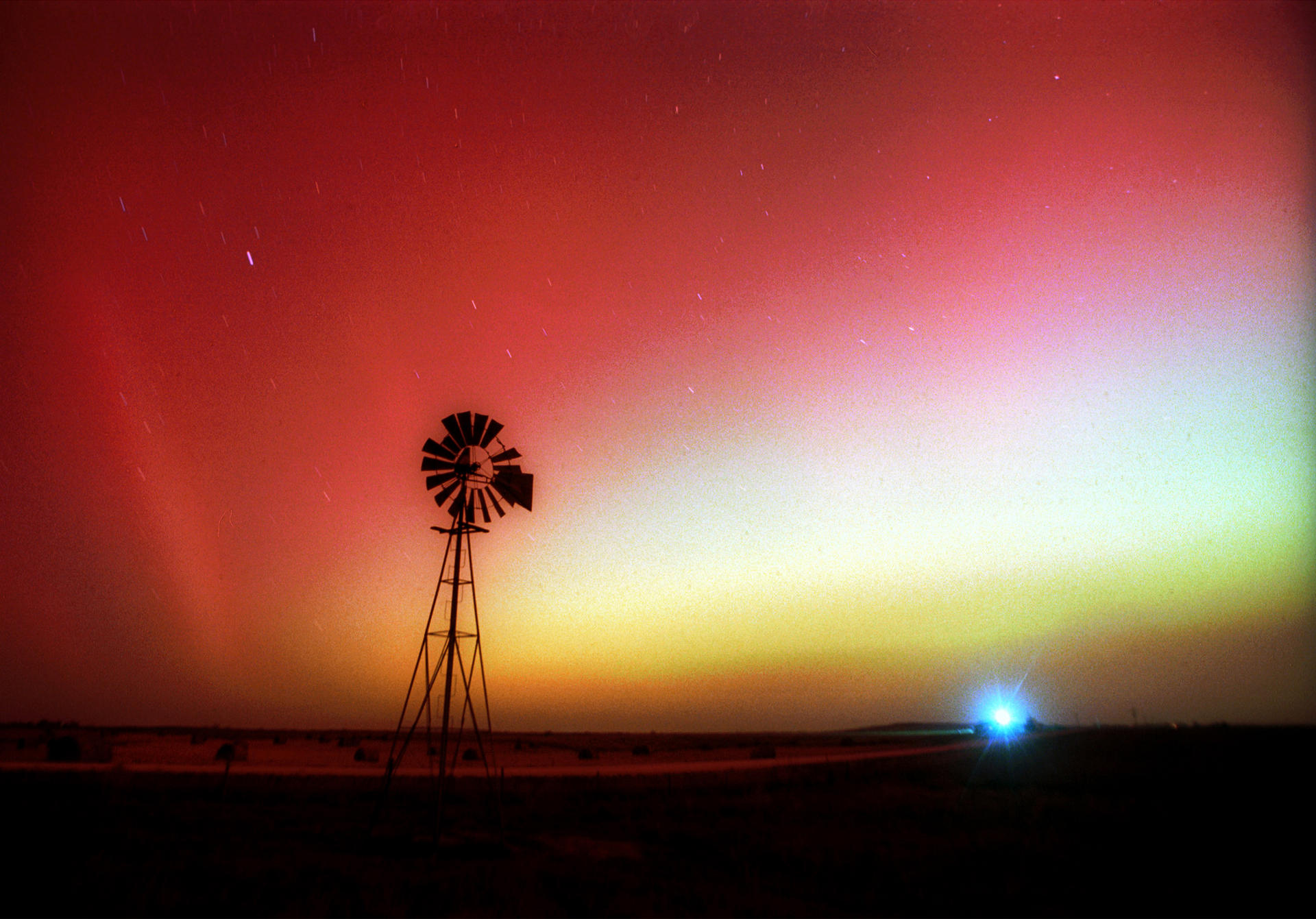 The aurora borealis, in a rare appearance above Kansas, is the most visible sign of the field that shields earth. Photo: AP