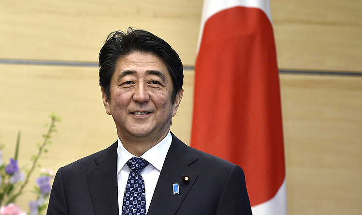 Prime Minister Shinzo Abe will seek discussions with President Xi next week. Photo: AP