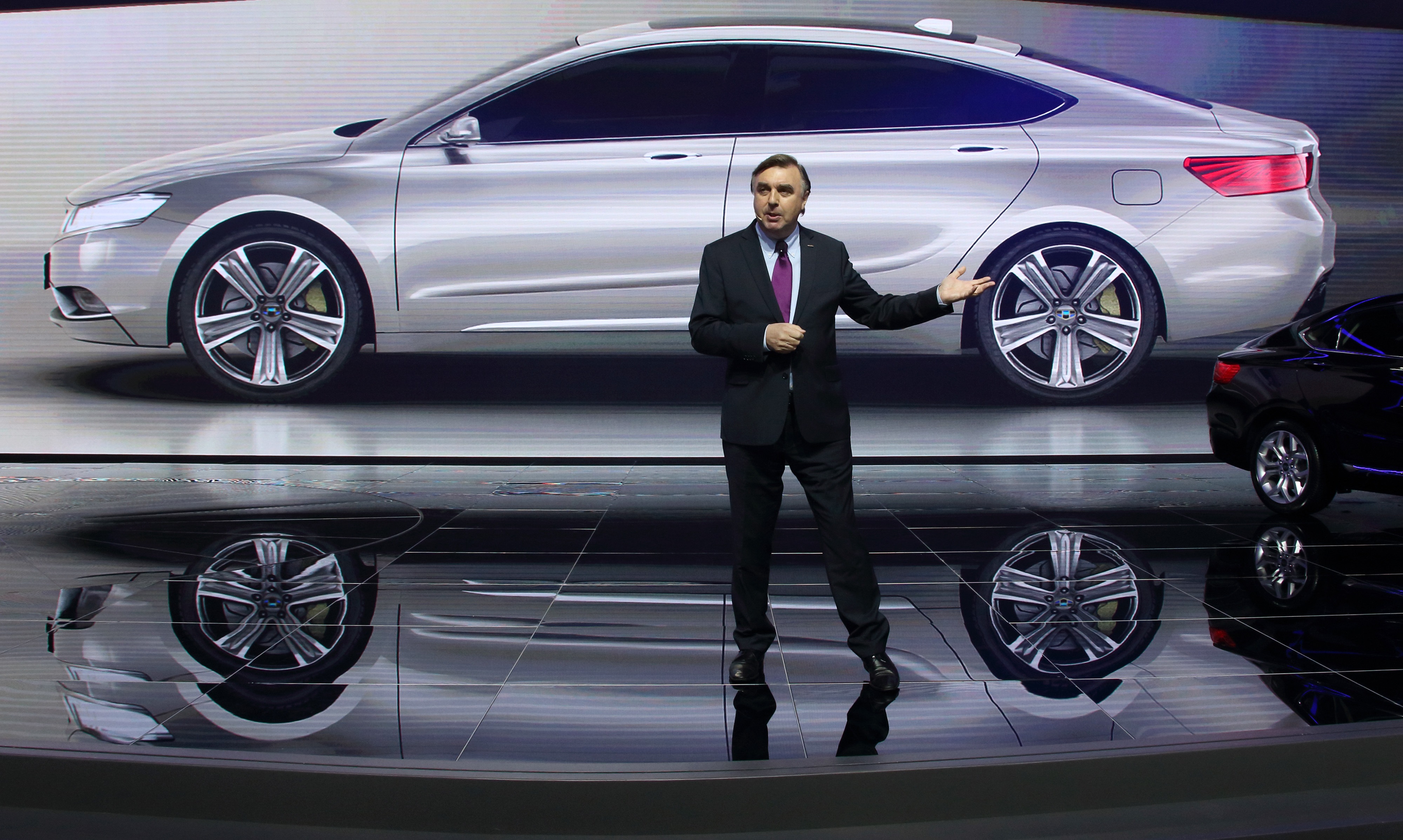 Peter Horbury, the design head of Chinese carmaker Geely, at the Shanghai auto show. Photo: Bloomberg
