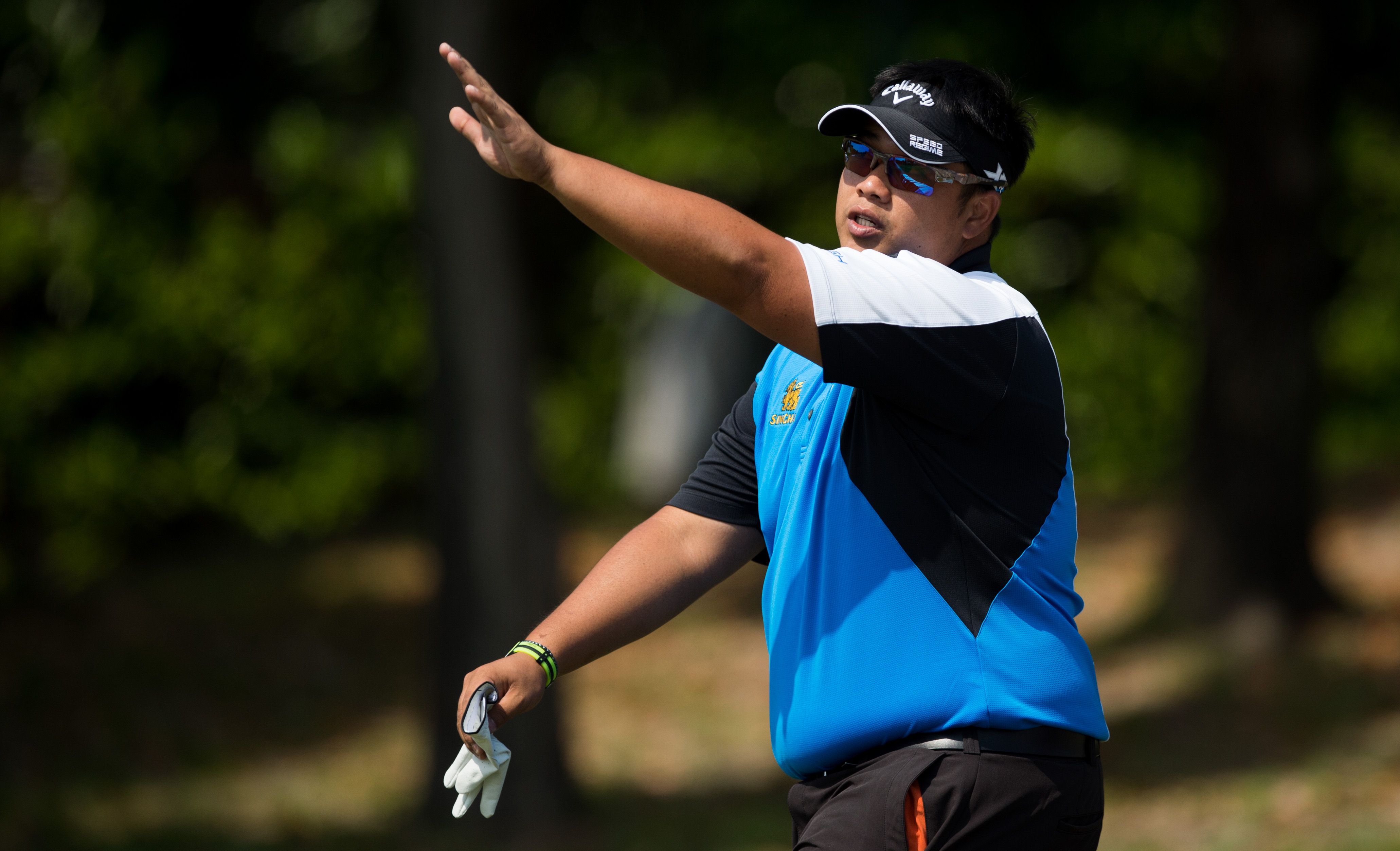 Kiradech Aphibarnrat of Thailand gestures during the first round of the Volvo China Open in Shanghai. Photos: AFP