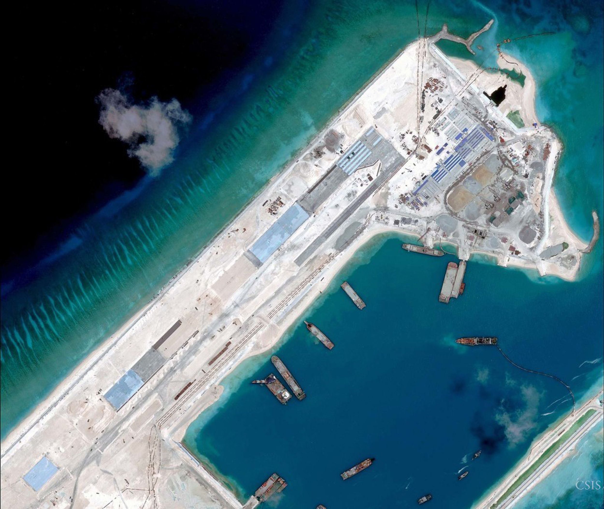 A satellite image released last month of what appears to be an airstrip Beijing is constructing in the disputed Spratly Islands in the South China Sea. Photo: AFP