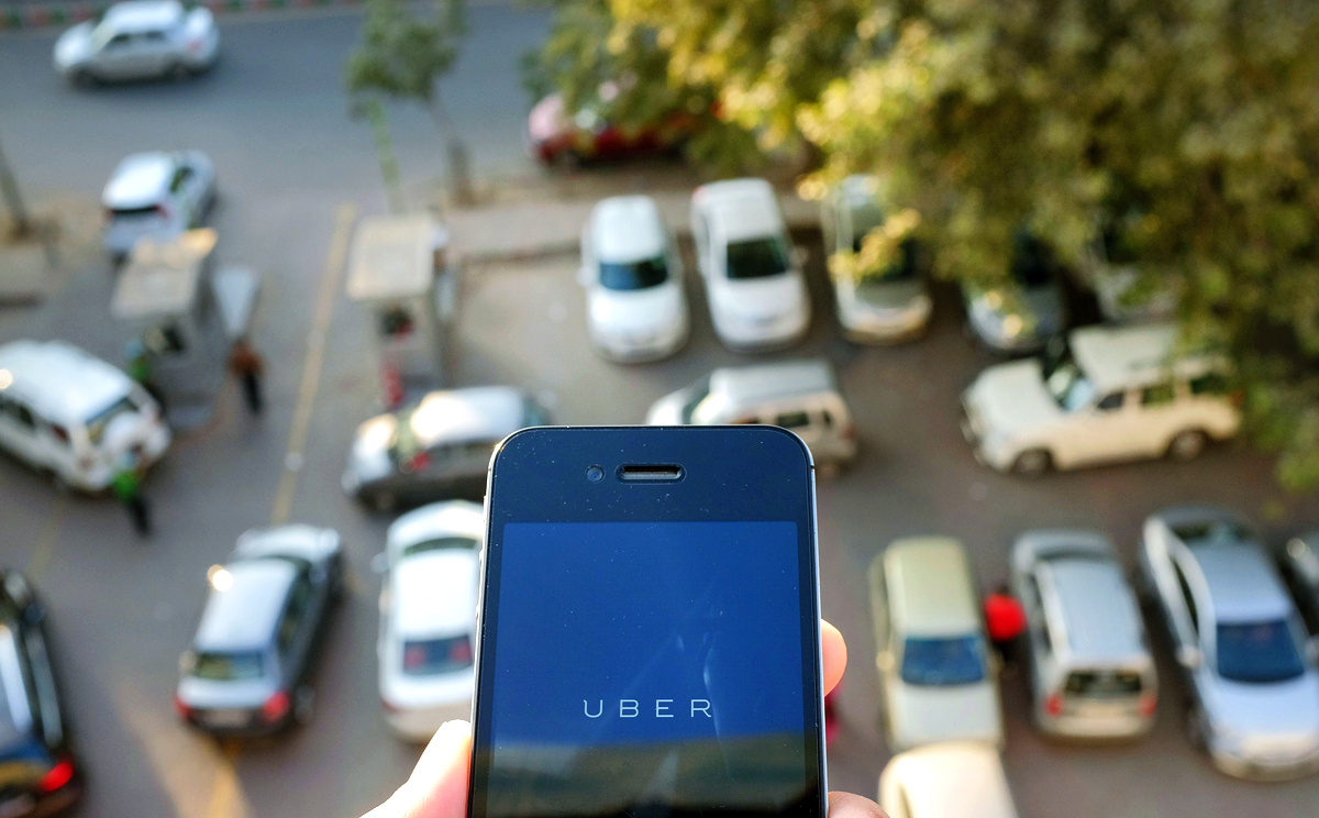 The use of the Uber smartphone app, which books taxis, has faced a number of legal challenges around the world. Photo: AFP