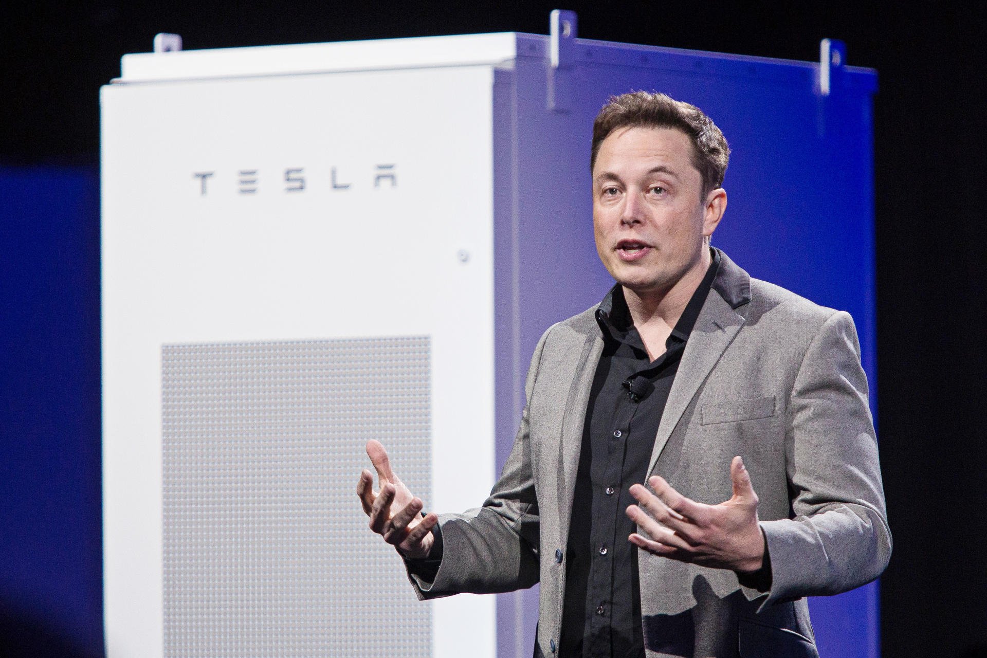 Tesla chief Elon Musk unveils the new batteries.Photo: Bloomberg