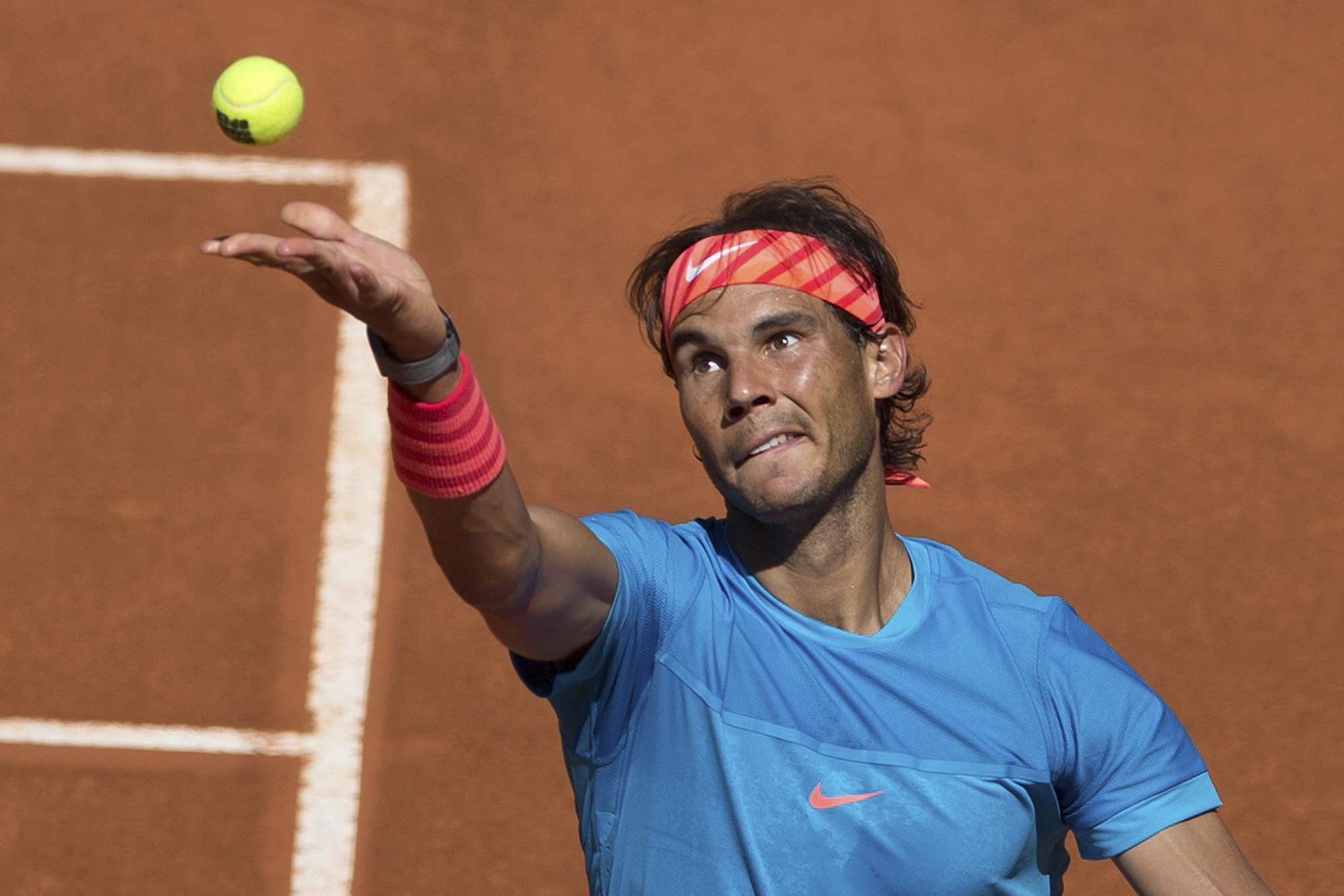 Rafael Nadal of Spain serves against Simone Bolelli. Photo: AP