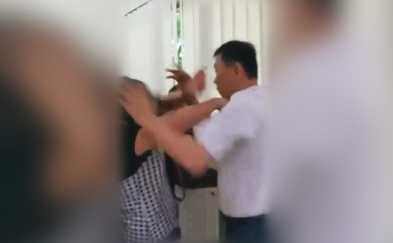 Screen grab of the video shows the man and two women in quarrel. Photo: YouTube