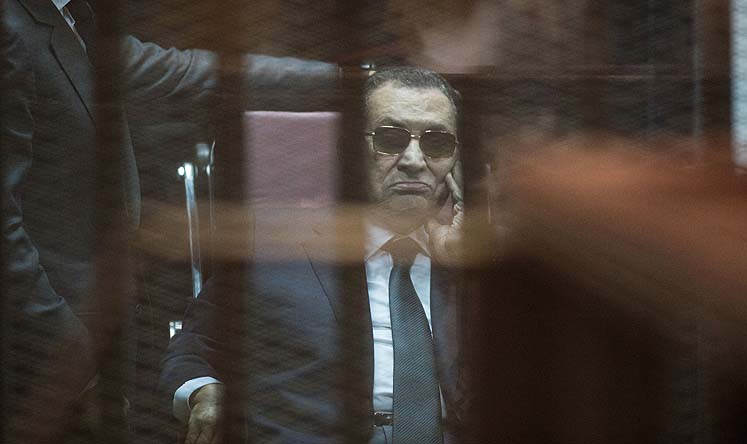 Egypt's former President Hosni Mubarak is seen inside the defendants' cage at court in Cairo on Saturday. Photo: Xinhua