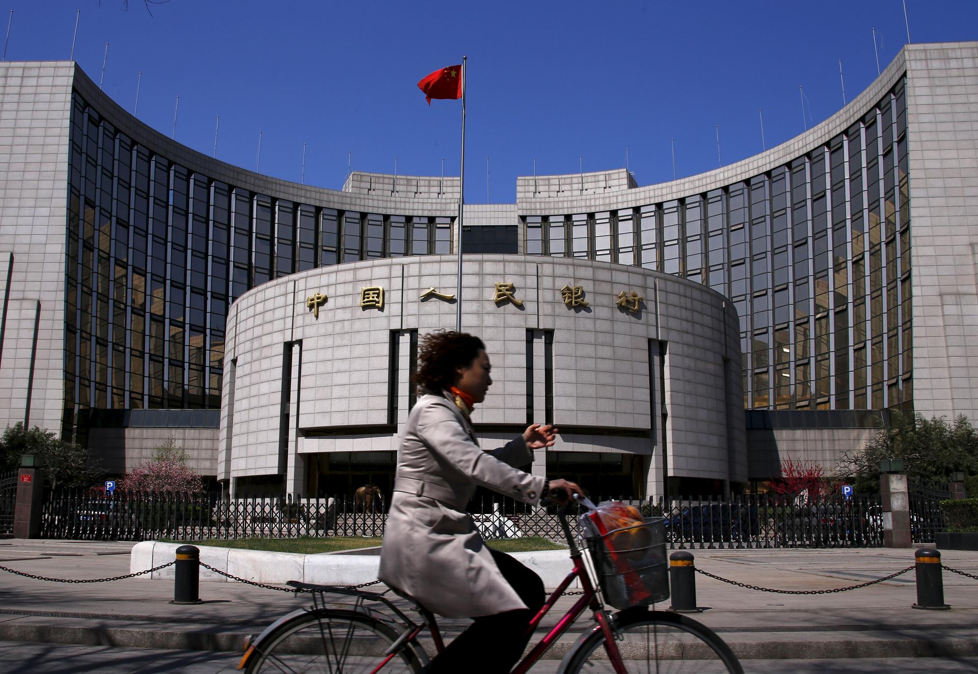 The People's Bank of China cut interest rates for the third time in six months on Sunday in a bid to boost the economy. Photo: Reuters