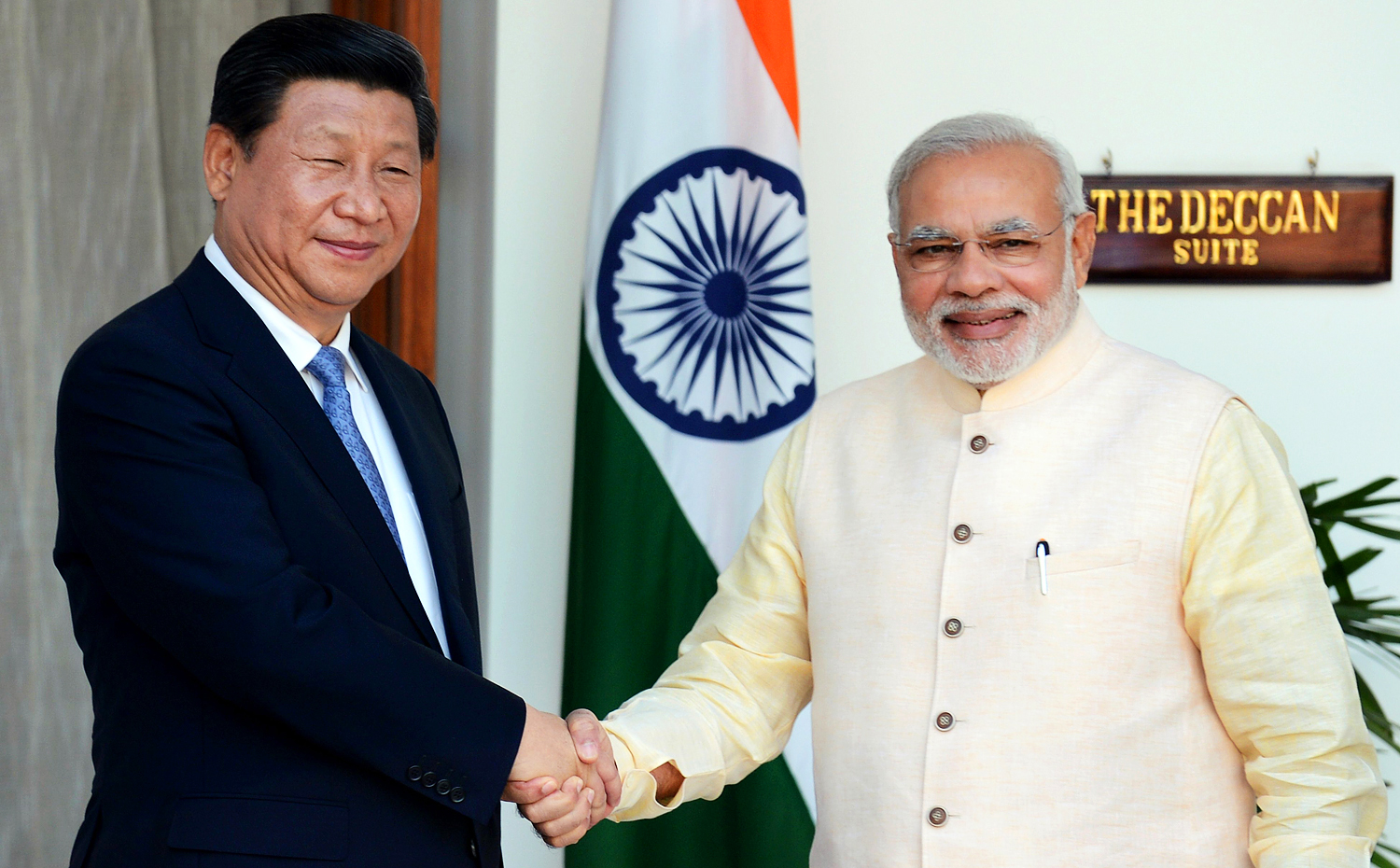 President Xi Jinping (left) is welcomed by Indian Prime Minister Narendra Modi during his visit in September. Photo: AFP 