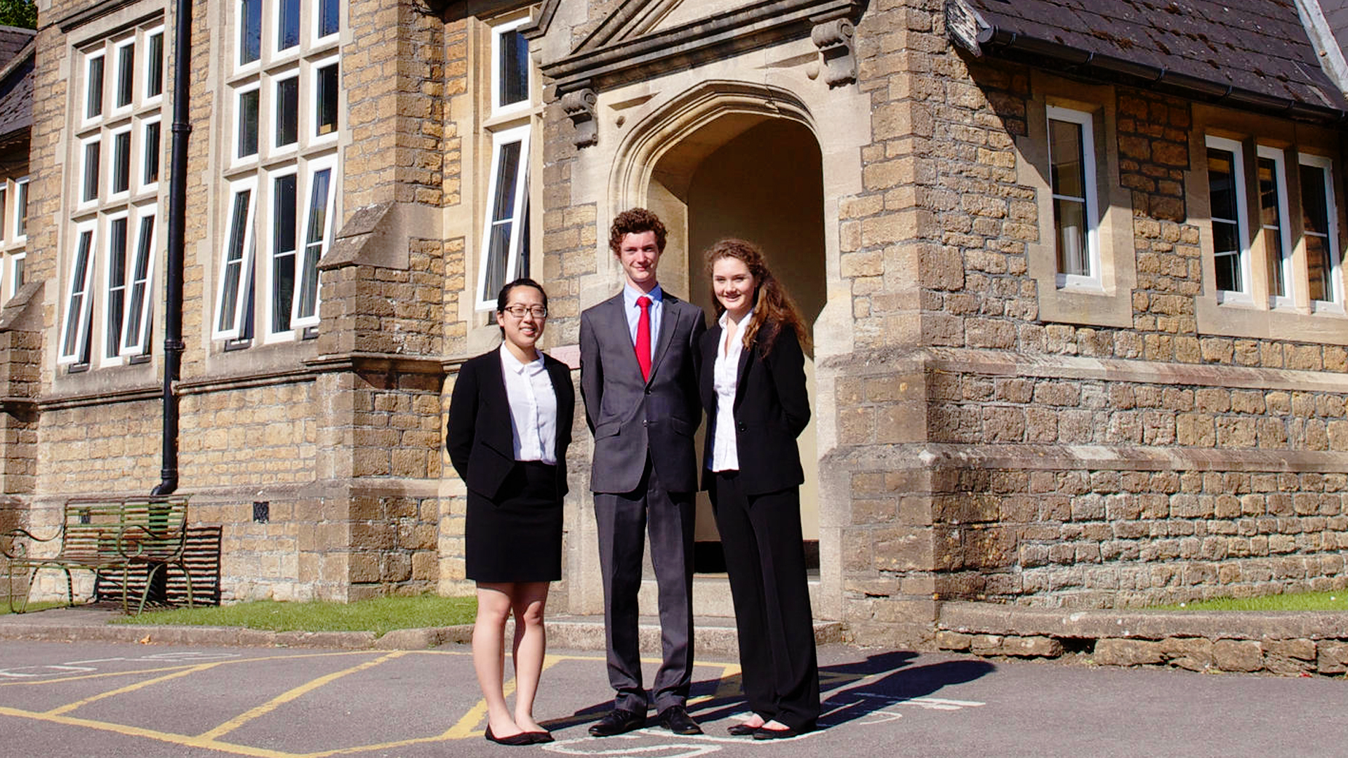Head girl for boarders Phoebe Hung (left) with Sexey's head boy and head girl.