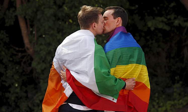 A couple embraces outside the count centre in Dublin as Ireland holds a referendum on gay marriage. Photo: Reuters