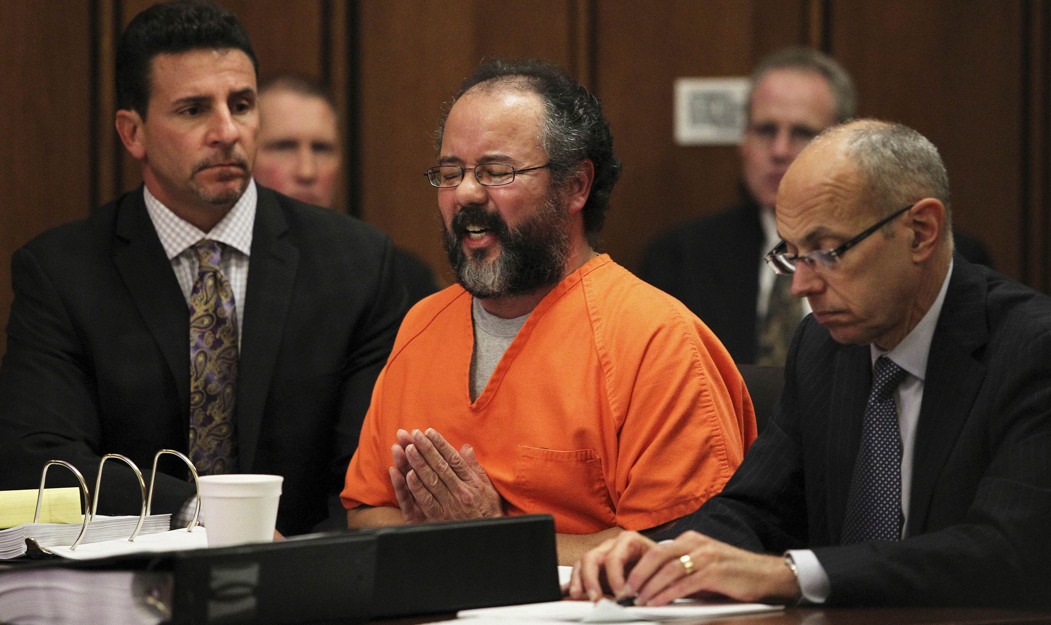 The hostage-taker, Ariel Castro, breaks down in court while talking about the child he fathered with Amanda Berry. Photo: Reuters