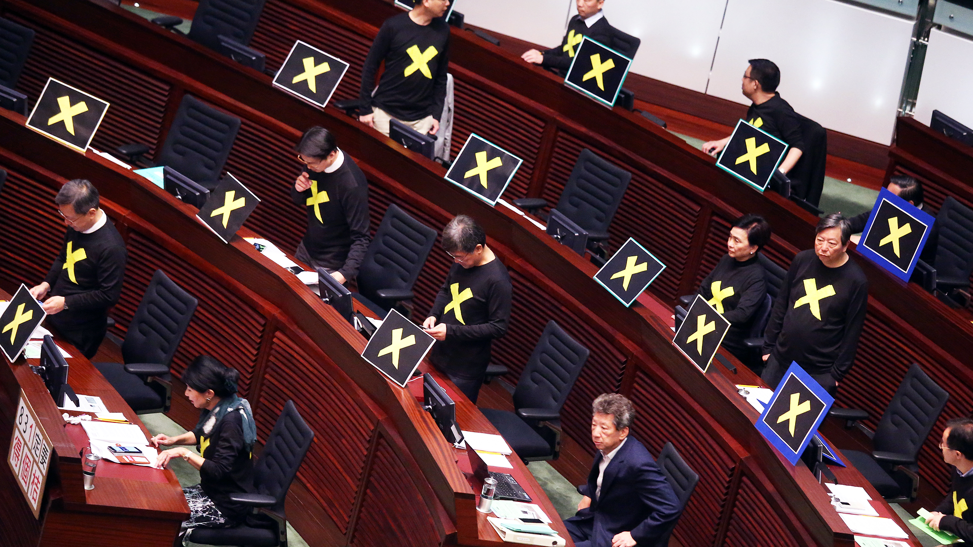 Pan-democrats leave the Legco chamber while Chief Secretary Carrie Lam Cheng Yuet-ngor gives her speech of political reform proposals in Tamar on April 22, 2015. Photo: K.Y. Cheng