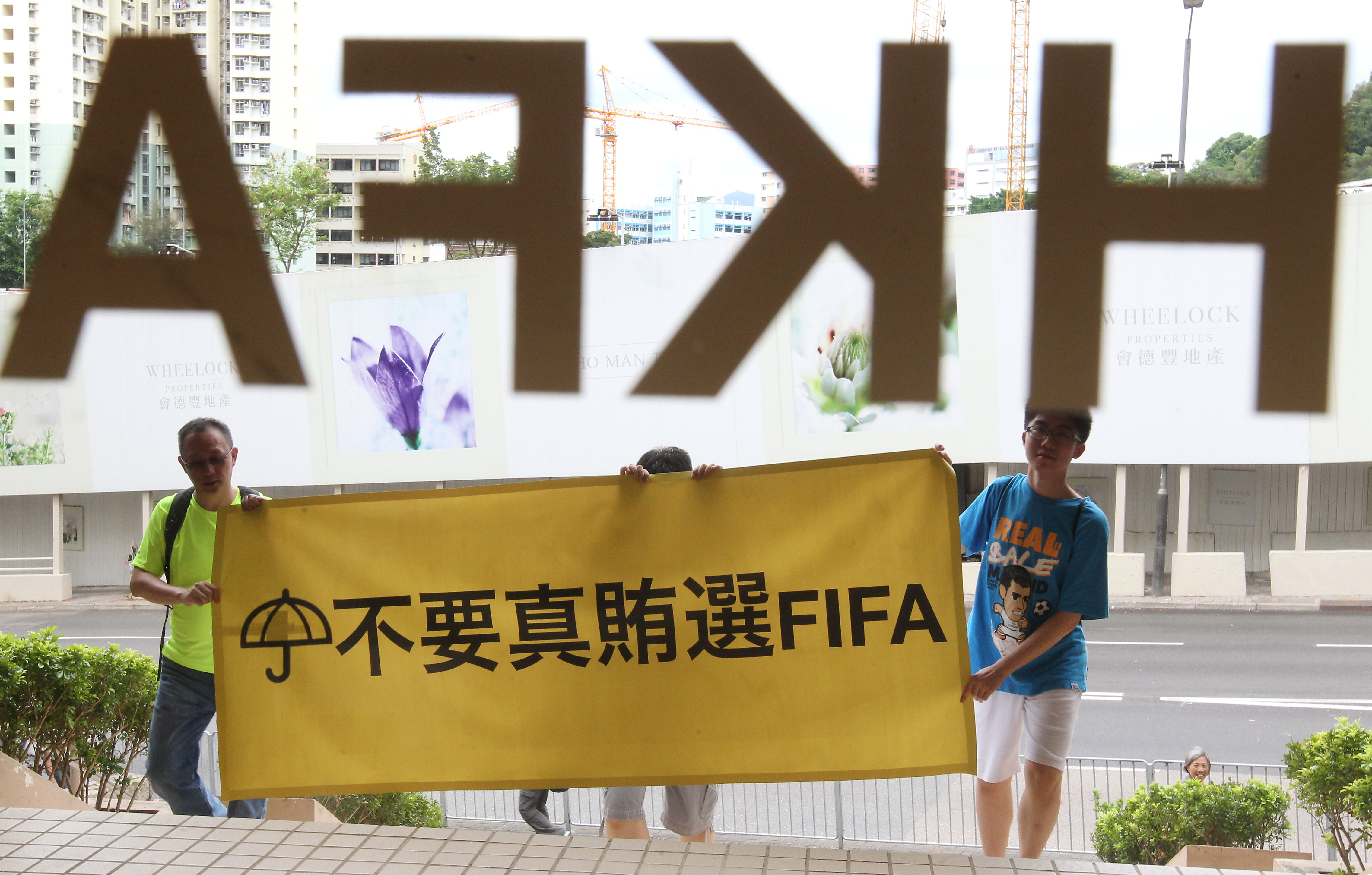 Soccer fans protest against HKFA President Timothy Fok Tsun-ting's decision to support Sepp Blatter as FIFA President outside Football Association in Ho Man Tin. Photo: Dickson Lee