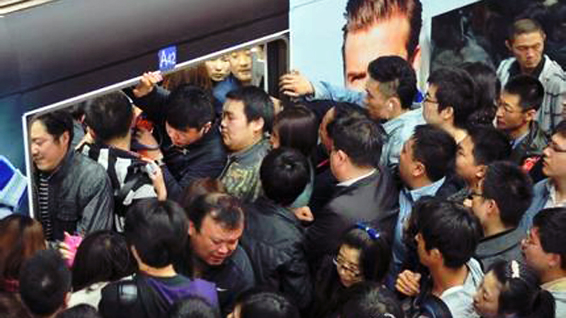 Beijing's subway system is notoriously crowded during peak hours. FILE Photo 