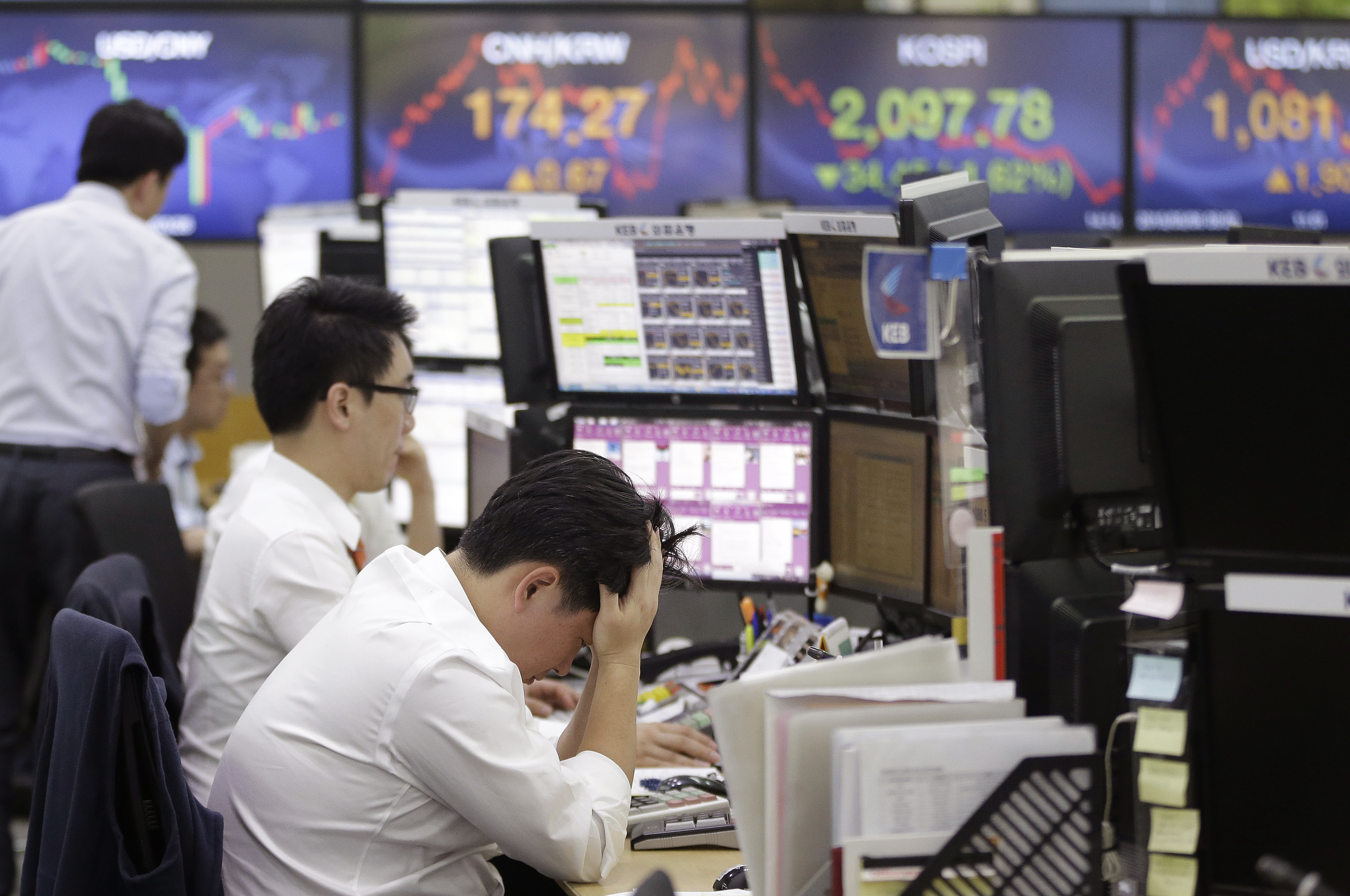 Foreign currency traders in Asia brace for the decision by MSCI whether to include Chinese A shares in its benchmark index on Wednesday. Photo: AP