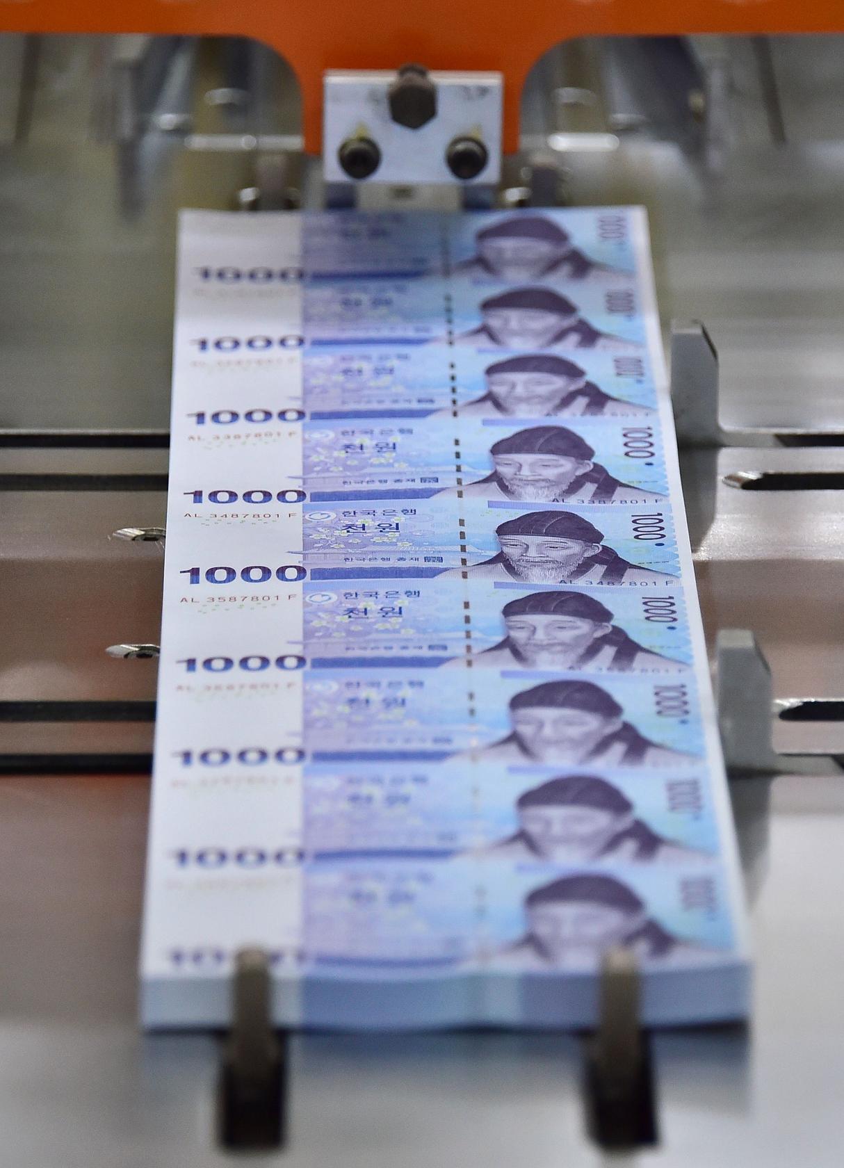 The Korean won slid 0.4 per cent this week against the US dollar. Photo: AFP
