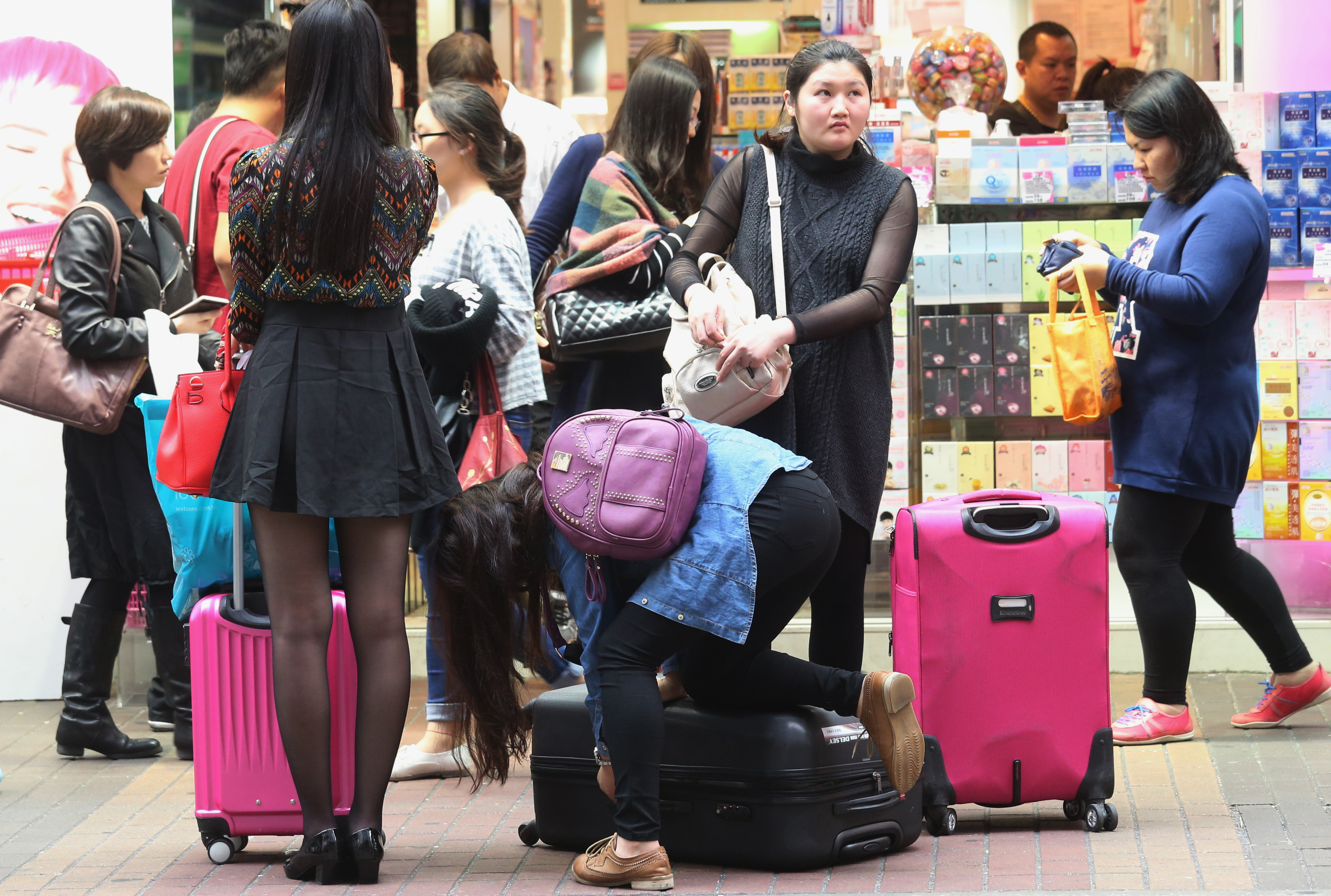 The sheer influx of mainland visitors in the city raises fears among some that Hong Kong may lose its identity. Photo: David Wong